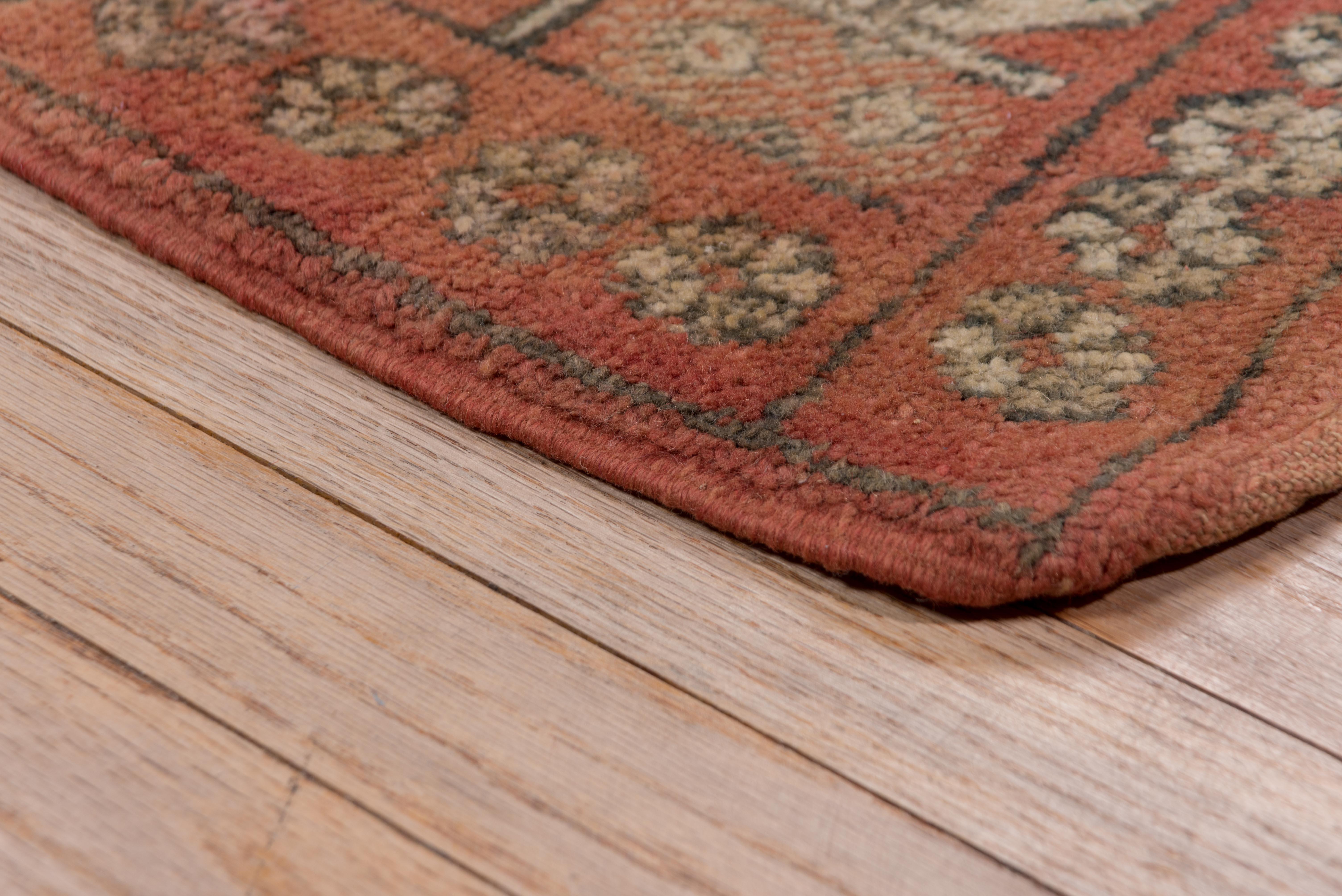 Alternating diamond patterns fill the boxes shaped throughout this gorgeous antique Moroccan village rug. 