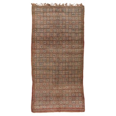 Motivos de diamantes en alfombra de pueblo marroquí