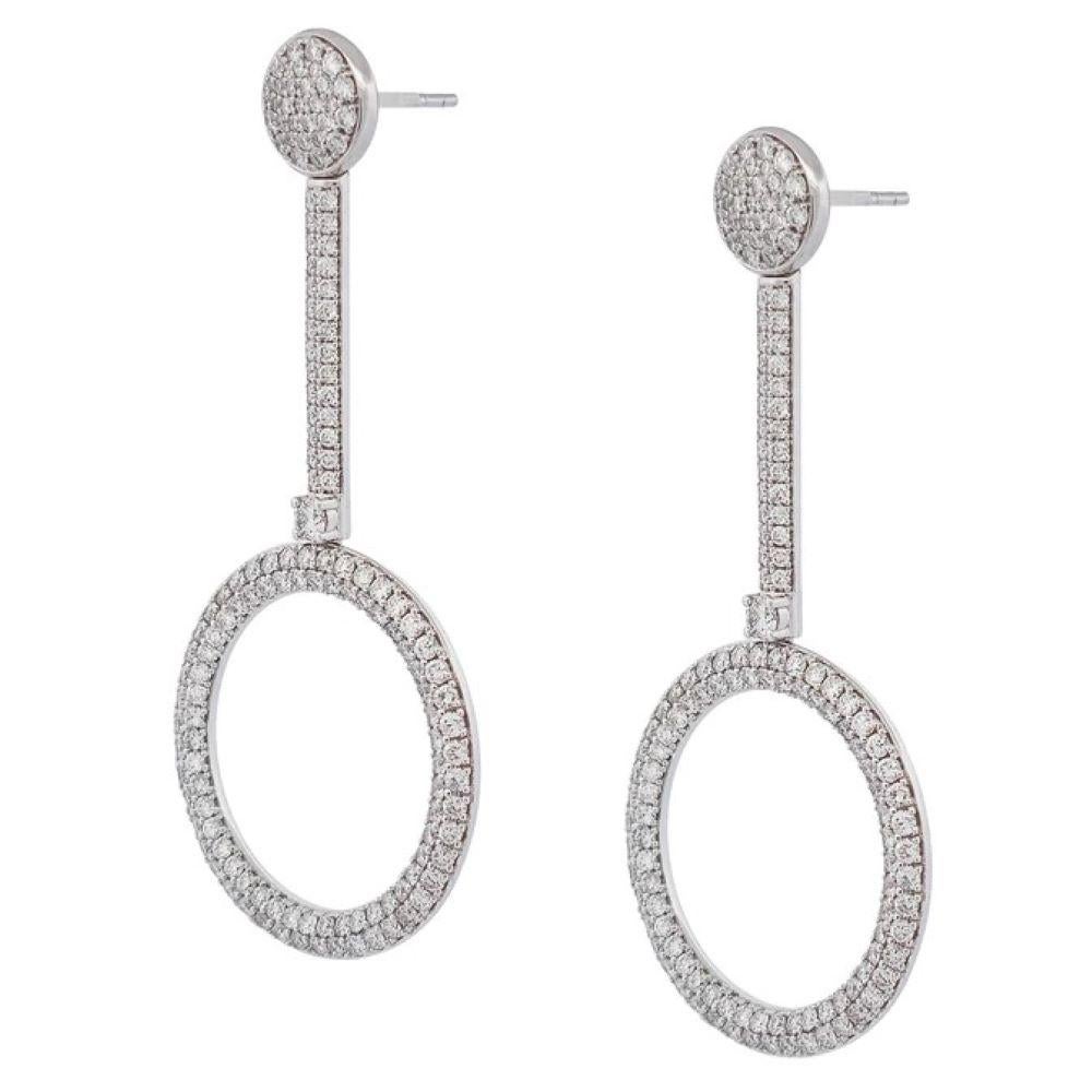 Glimmering 14 karat white gold drop earrings with spectacular diamond pave hoop drops - a stunning look you won't soon forget.

14kt. White gold 
Drop Earrings with Diamond hoops
Diamonds: 4.50ct TW Diamond Pave