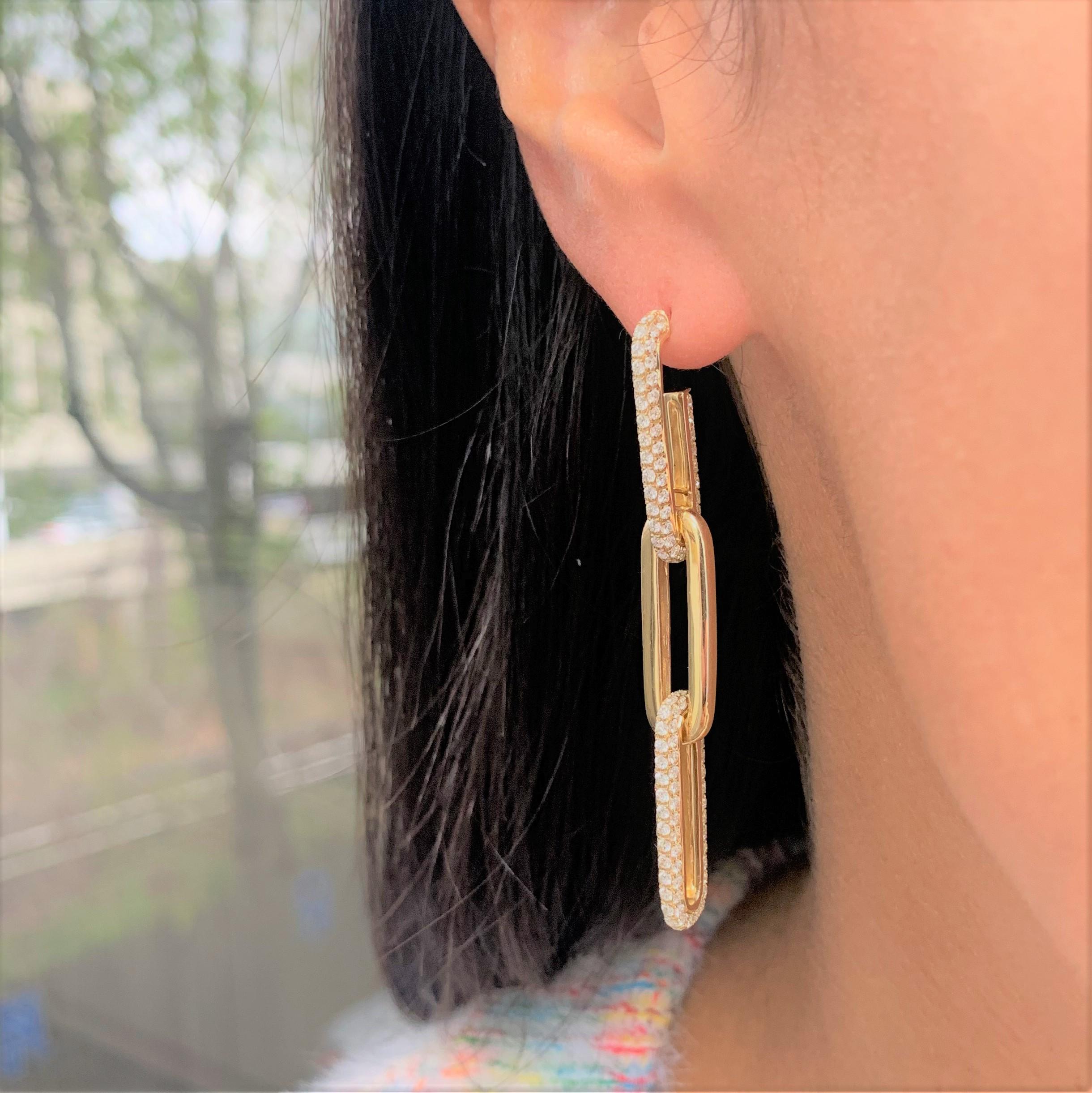 These Trendy and appealing 14k gold and Diamond Dangle Link Earrings are a must-have! They make the best addition to your jewelry collection! Featuring  3.73 ct. of Diamonds. Available in white, yellow & rose gold.  

-14K Gold  
-3.73 ct. White