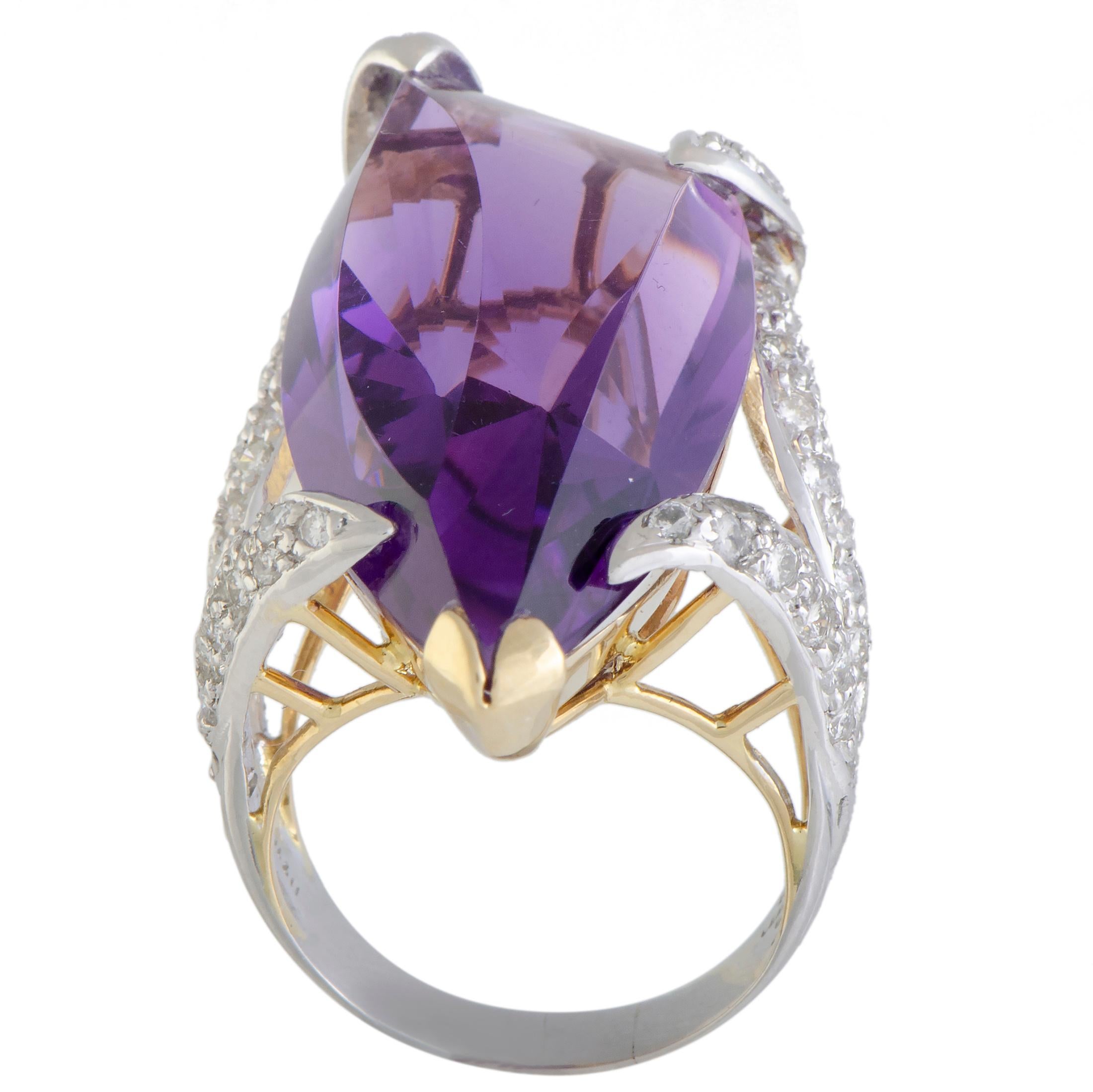 Bringing a delightful artistic approach to jewelry design, this extraordinary ring compels with its offbeat fashionable style and attractive gemstone décor. The ring is made of platinum and 18K yellow gold and it is set with a total of 1.16 carats