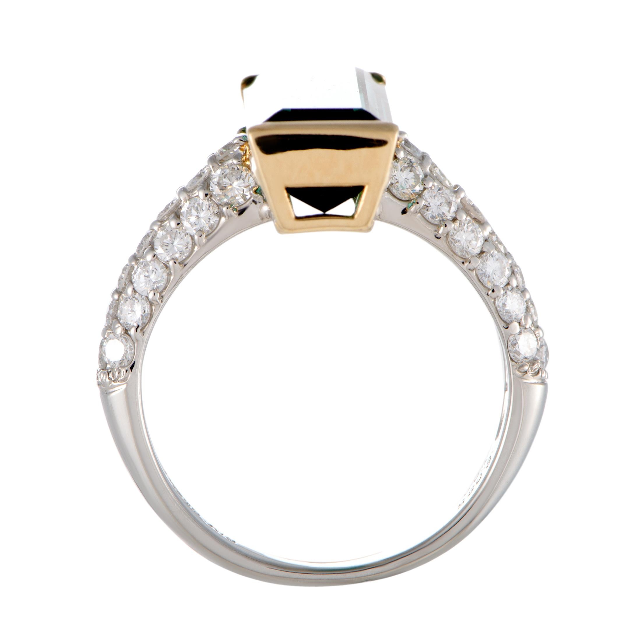 Wonderfully crafted from a luxurious blend of platinum and 18K yellow gold and lavishly decorated with resplendent gems, this superb ring boasts a stunningly prestigious appeal. The ring is set with scintillating diamonds that amount to 1.00 carat