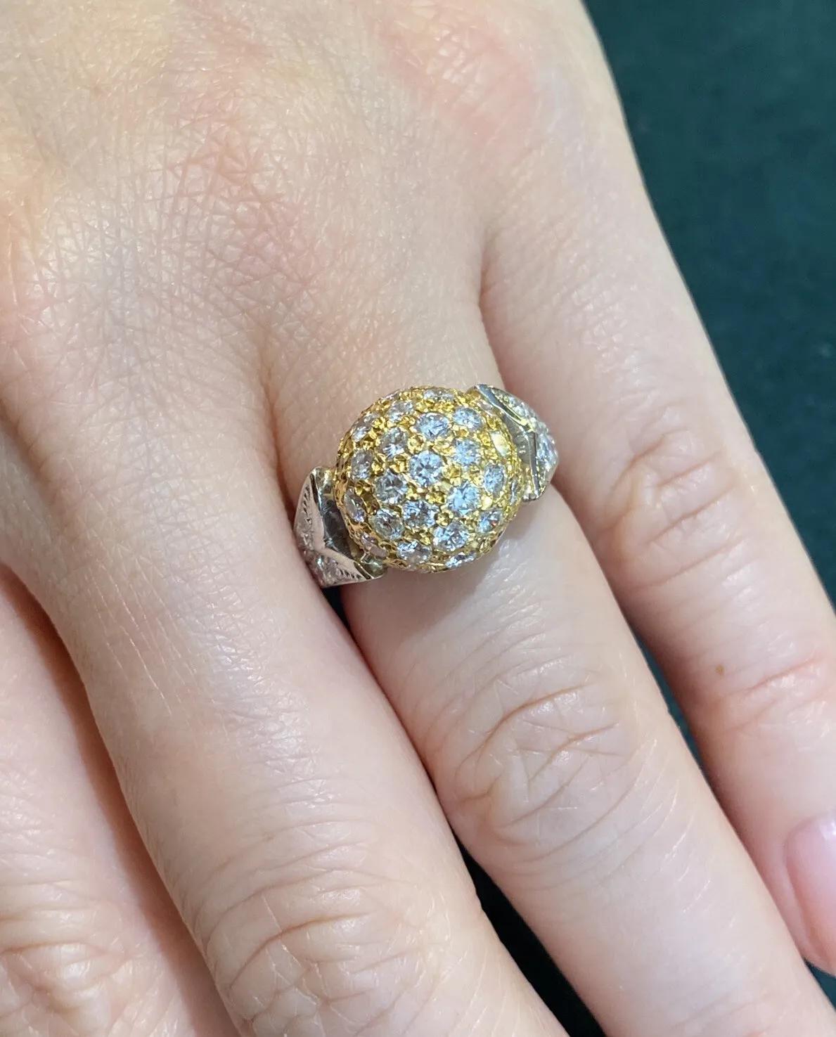 Diamond Pave Ball Ring

Diamond Pave Ball Ring features an 18k Yellow Gold Ball covered entirely by 2.00 carats of Round Brilliant Diamonds with a Platinum Shank which is covered in Diamonds half way down the Ring.

Total Diamond weight is