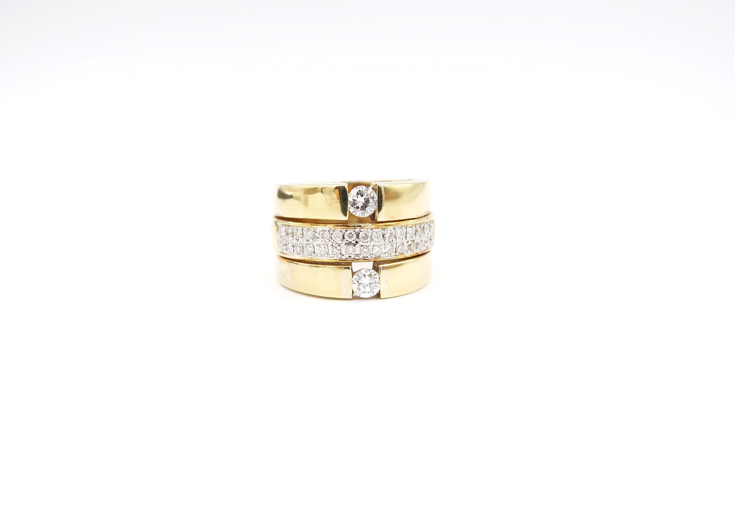 Diamond Pavé Band Sandwiched by Diamond Solitaire 18 Karat Yellow Gold Band Ring

Ring size: 55, UK N 1/2, US 7 1/2
Width: 0.5 inch

Gold: 18K 11.53g.
Diamond: 0.54ct.