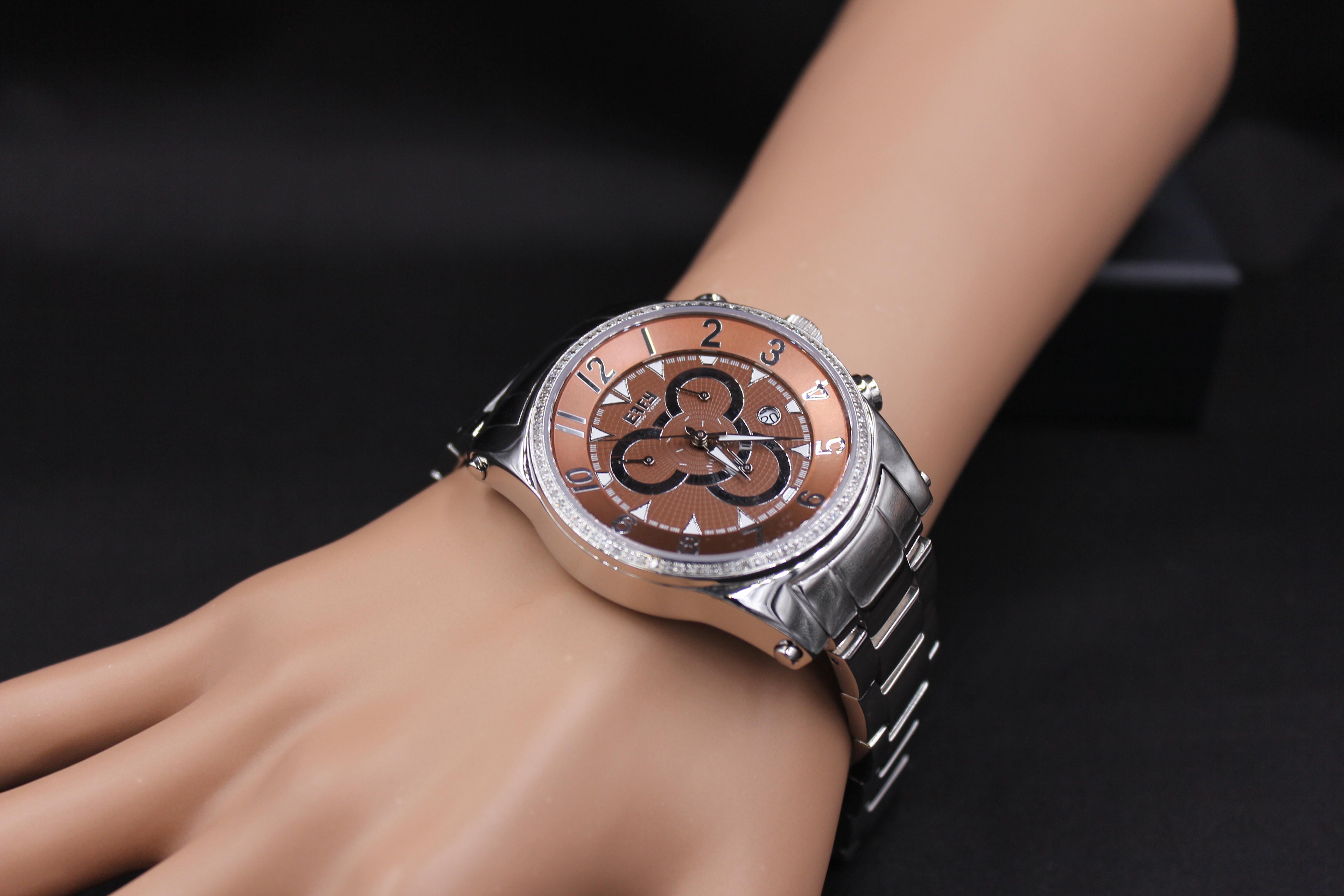 ·  Quality Swiss-Quartz movement guarantees precision timing
·         Mother-of-Pearl dial micro-paved with diamonds and gemstones enhances any dress style
·         Scratch-resistant sapphire glass lens
·         Genuine exotic leather strap or