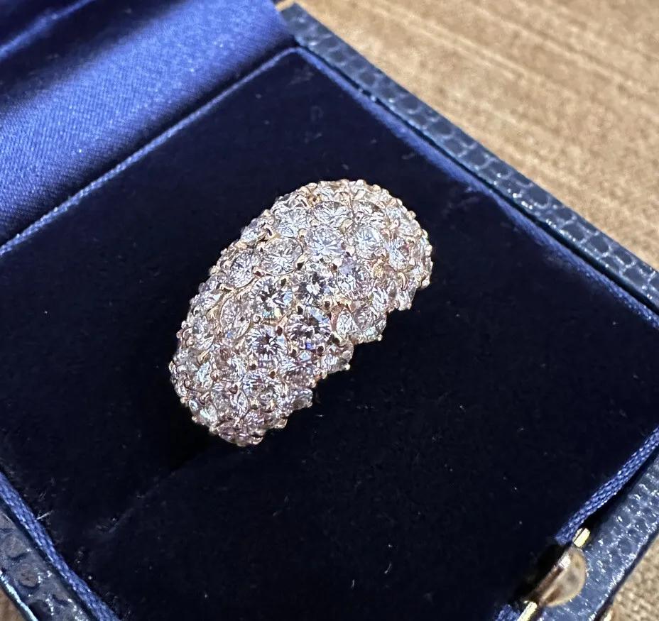 Diamond Pave Dome Ring 3.80 Carat Total Weight in 18k Yellow Gold.

Diamond Dome Ring features 3.80 carats of Round Brilliant Diamonds Pavé set in dome style, all in an 18k Yellow Gold setting.

Ring size is 5.5.
Ring measures .45 inches in width
