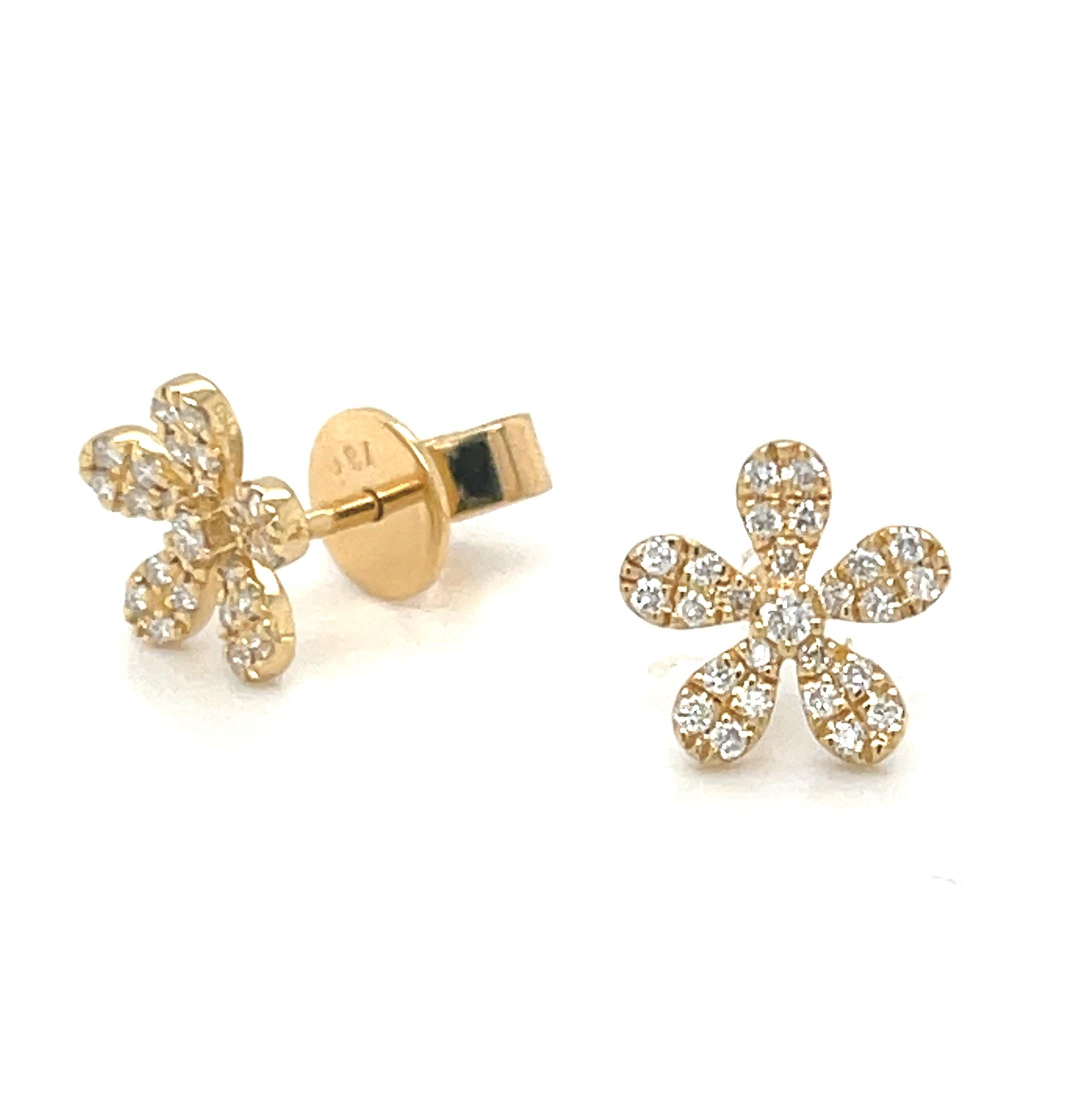 These pretty diamond earrings are a perfect way to make any day feel like a special occasion! Sparkling brilliant white diamonds have been pave set in a lovely floral design crafted from 18k yellow gold. What a wonderfully effortless way to bring a
