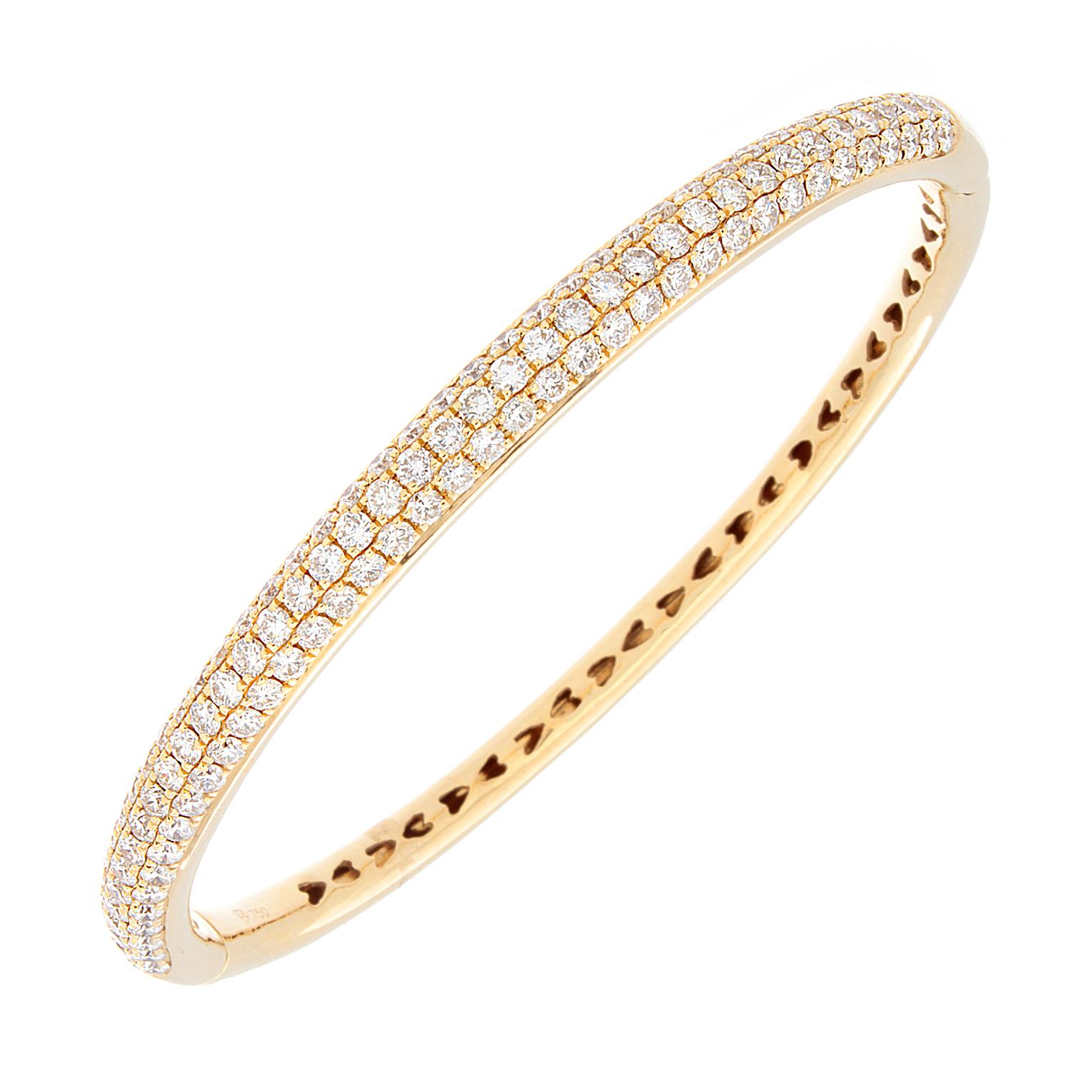 A sparkling bracelet featuring just under 4 carats of VS quality diamonds set in 18K yellow gold with a secure fastening lock enclosure. A lovely piece to wear everyday or dress up in an evening gown. 

Wrist Size: 6 ½ inches  

