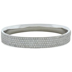 Bracelet jonc rigide en or pavé de diamants