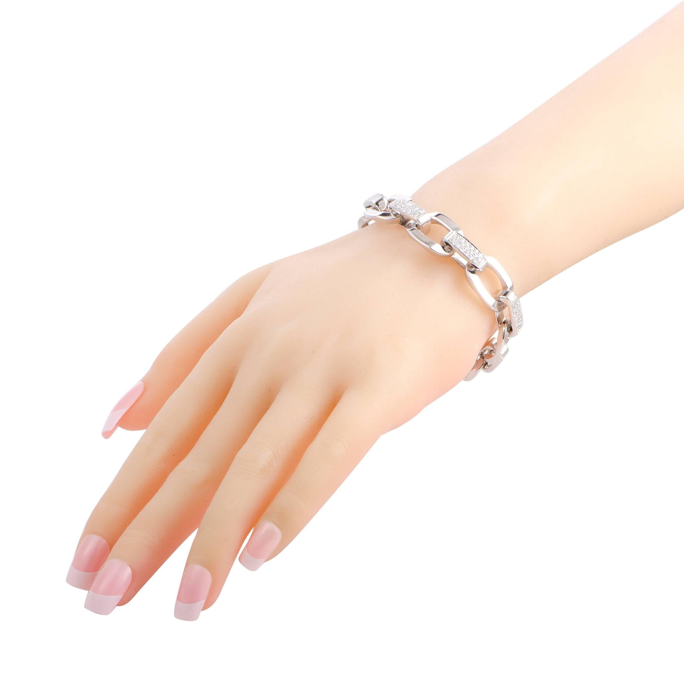 Made of luxurious 18K white gold in a splendidly elegant manner, this exceptional bracelet offers an incredibly classy, refined appearance. The bracelet is decorated with diamonds of G-H color and VS1 clarity that weigh 2.00 carats in