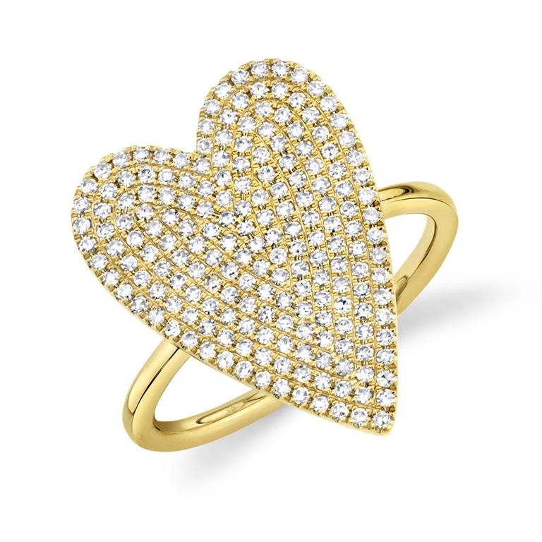 Make your love shine with this stunning pave diamond heart ring. This ring features a shimmering heart-shaped center decorated in sparkling diamonds (0.26carat total weight)  in 14kt gold. Size 6.

