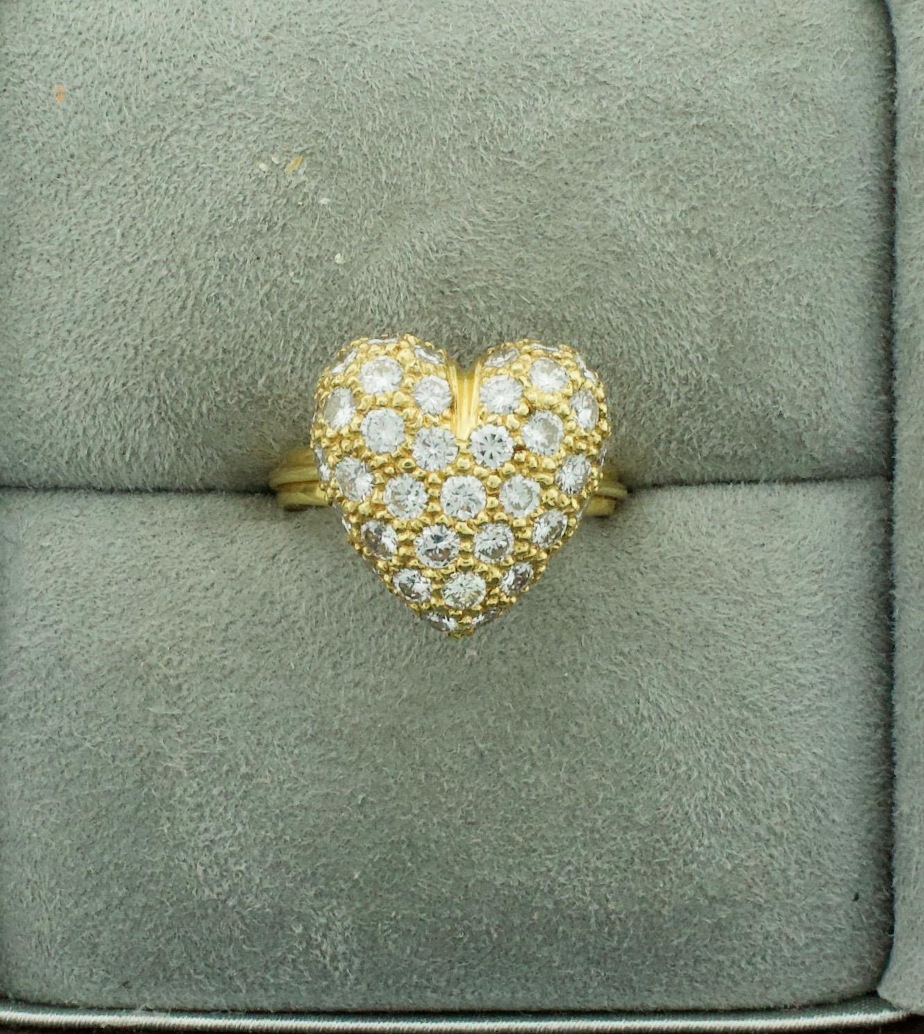 Diamond Pave' Heart Ring in 18k 2.54 carats
Fifty Seven Round Brilliant Cut Diamonds weighing 2.54 carats approximately [GH VVS- VS1]
Currently Size 6.25 Can Be Sized By Us Or Your Qualified Jeweler
