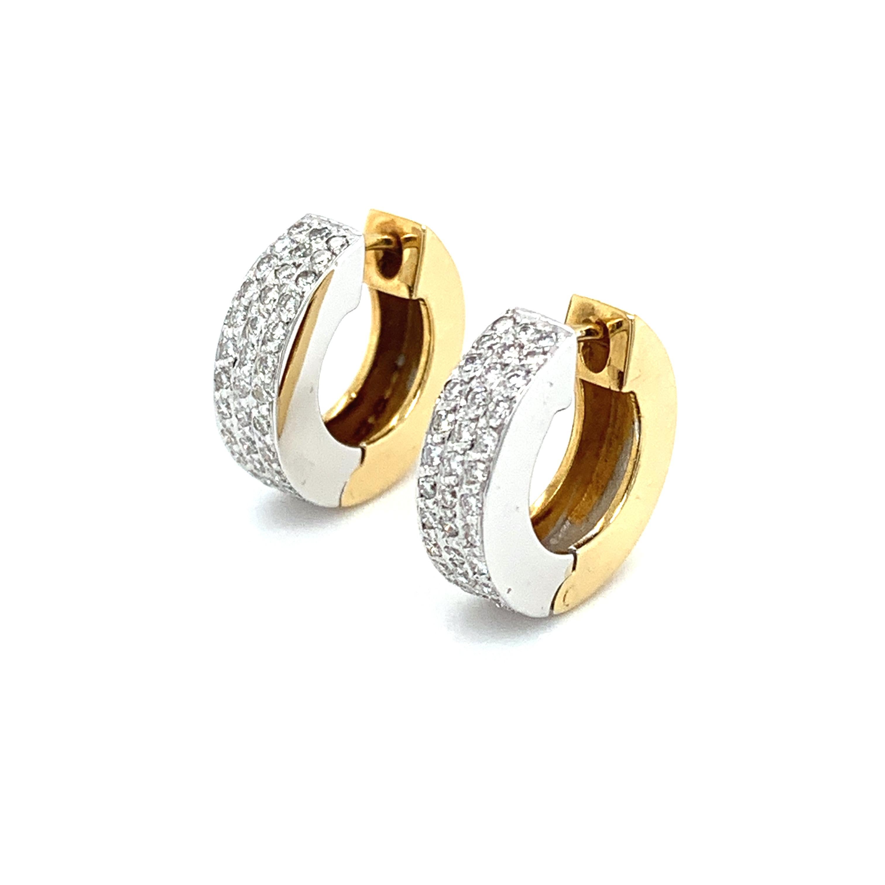 Diamond pave hoops huggies clip earrings 18k yellow and white gold
Composed of 0.80ct round brilliant diamond cut pave setting hoops clip on earrings in 18k white and yellow gold.
Combination of 18k yellow an d white gold chunky look hoops