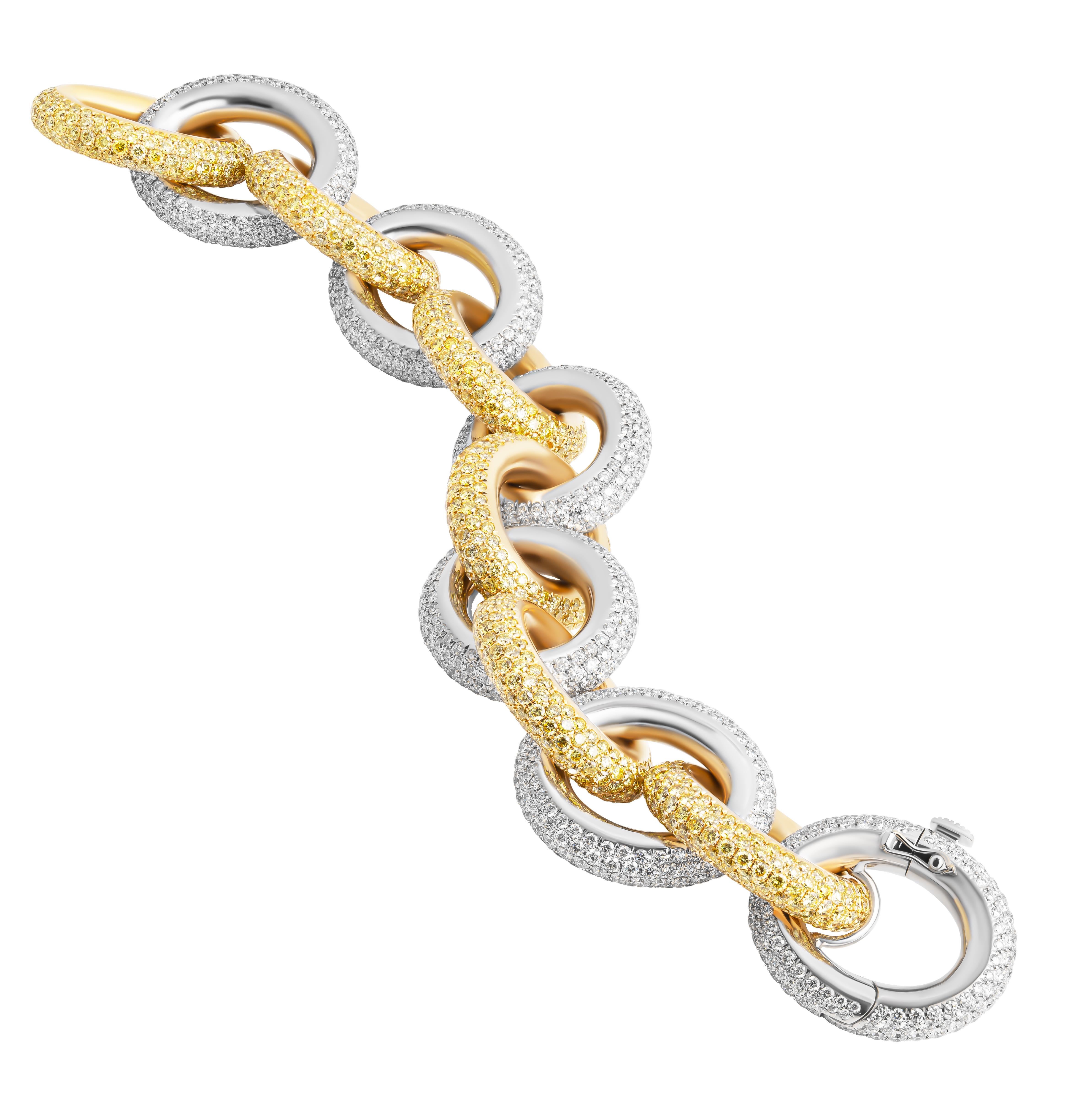 18K Gelb & Weißgold Gliederarmband
Weiße Diamanten mit insgesamt 1200 Steinen 42,07ct 
Gelbe Diamanten mit insgesamt 1200 Steinen 42,13ct
Natürliche Steine - fancy gelb VVS Klarheit und F-G Farbe VVS Klarheit
Gewicht: 145.2gr
6.5-7''