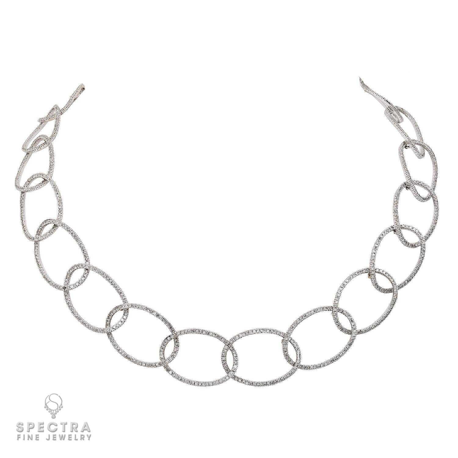An infinity design can take many forms, most often comprised of a single type of stone in all the same size, shape, cut, and color, flowing around the entirety of the jewel. In this case, the infinite flow is of a singular motif, arranged in a