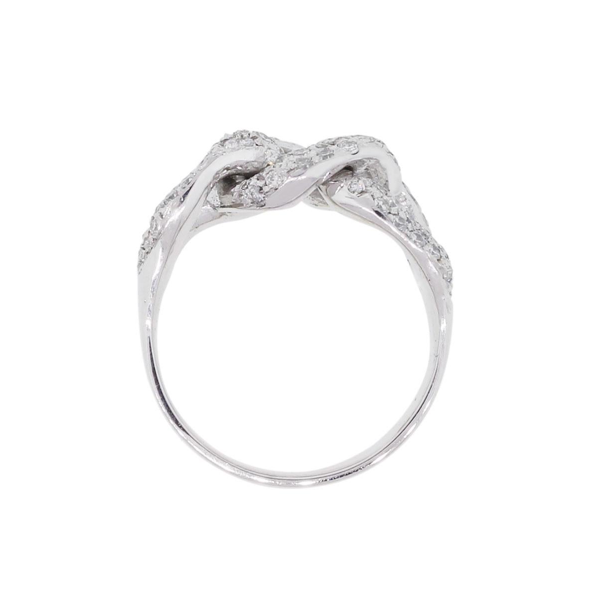 Material: 18k white gold
Diamond Details: Approximately 1ctw of round brilliant pave set diamonds. Diamonds are G/H in color and VS in clarity
Ring Size: 6.50 (can be sized)
Ring Measurements: 0.88″ x 0.42″ x 0.78″
Total Weight: 7.7g