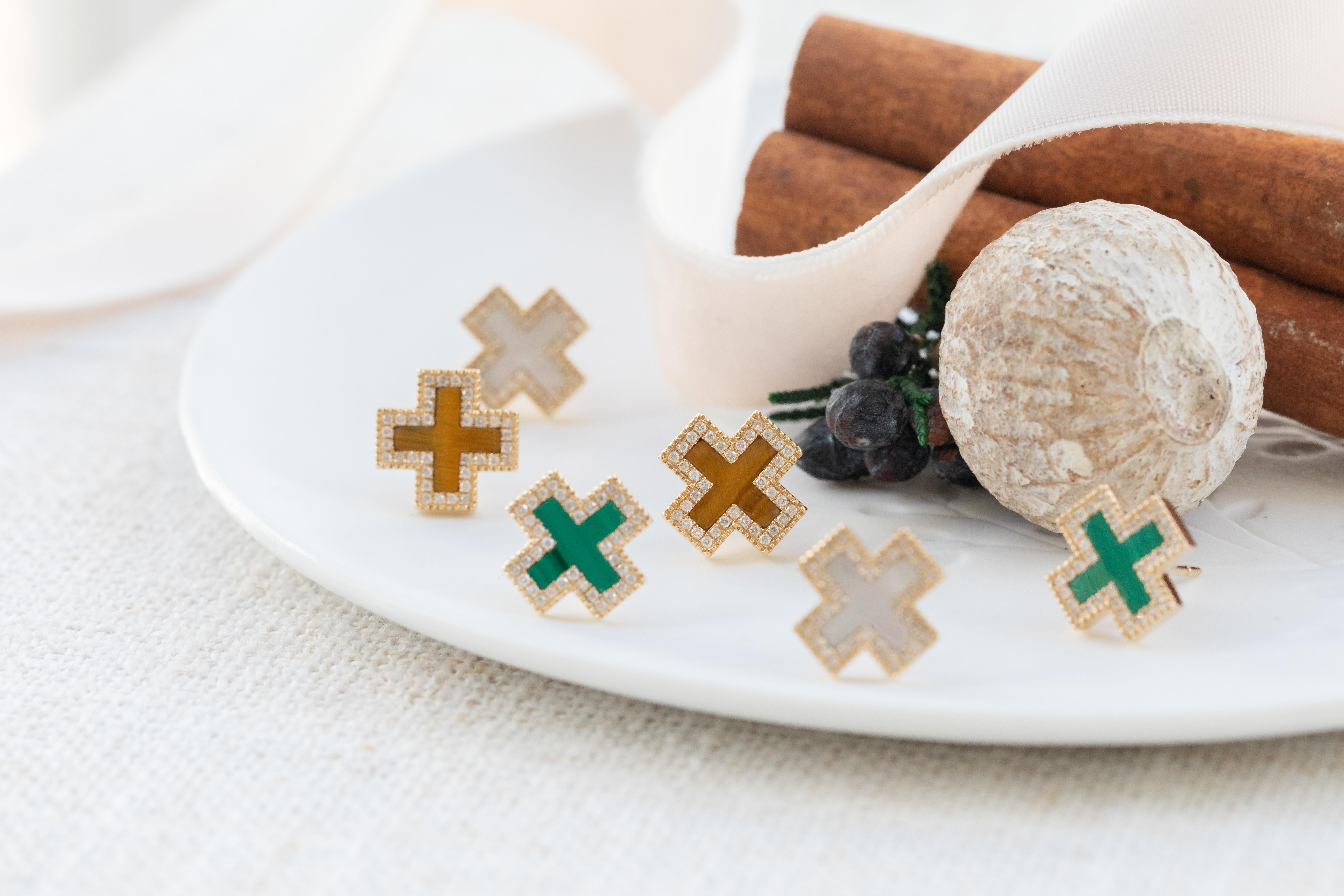 A twist on our best-selling Heirloom Stud Earrings, the Pave Malachite Inlay Heirloom Studs are a classic staple. These fun classics feature hand-cut malachite surrounded by diamonds to fill the ear.

The GATES Collection by M. Flynn is a jewelry