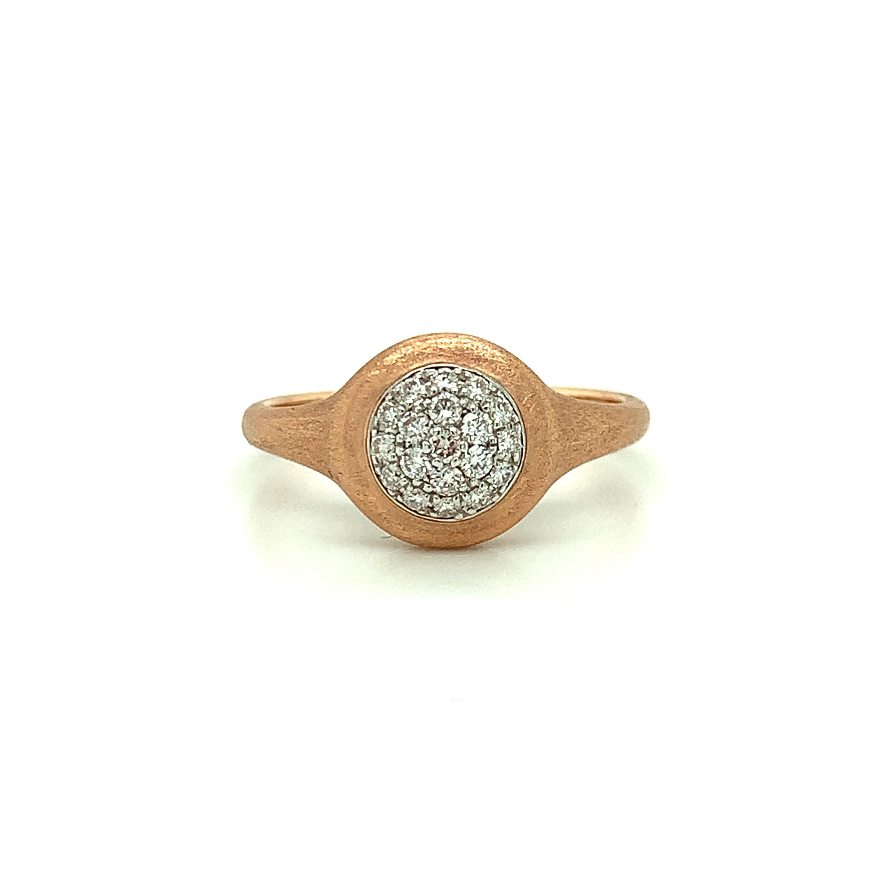 Simple and beautiful, this diamond and gold ring is perfect for everyday wear! Our pretty 14k rose gold ring has a gorgeous brushed finish and features sparkling round brilliant-cut white diamonds that have been pave set in a striking circular