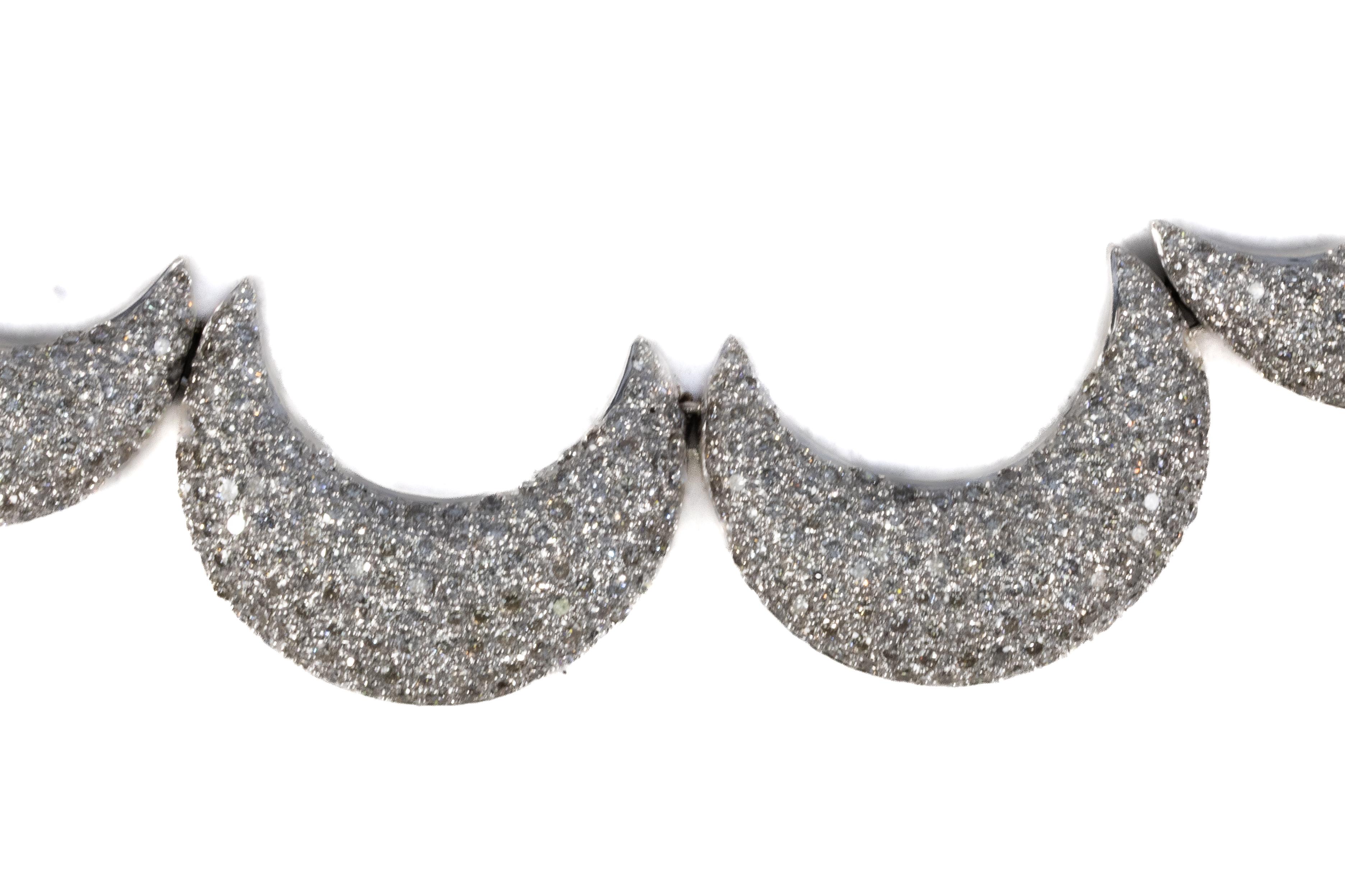 Diamond Pavé Scalloped Collar Necklace

Description:

 A striking diamond collar necklace designed in an elegant scalloped motif, each section fully pavé-set with brilliant-cut diamonds that shimmer with exceptional radiance. The repeated