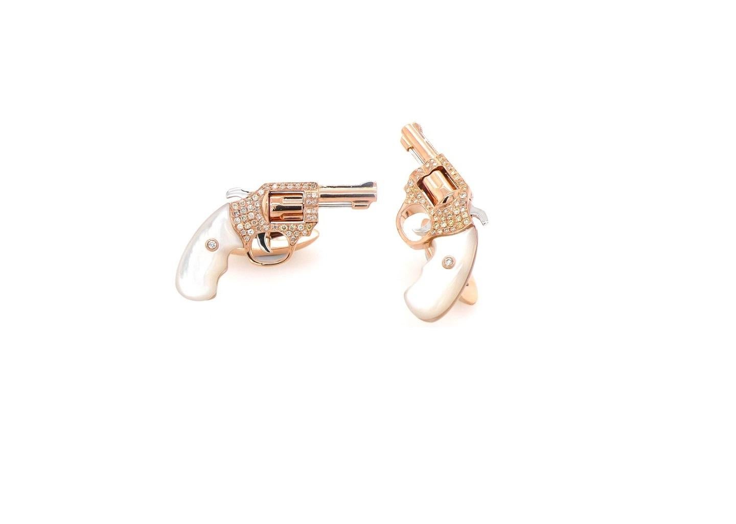Diamond Pave White Pearl Luxury Gun Revolver 18 Karat Gold Unique Men Cufflinks

Natural Gemstone & Diamonds 1.20 CTW. Available in 18 karat yellow, rose and white gold alloys. 
Made to Order Luxury Cufflinks - Customizable
This is a combination of