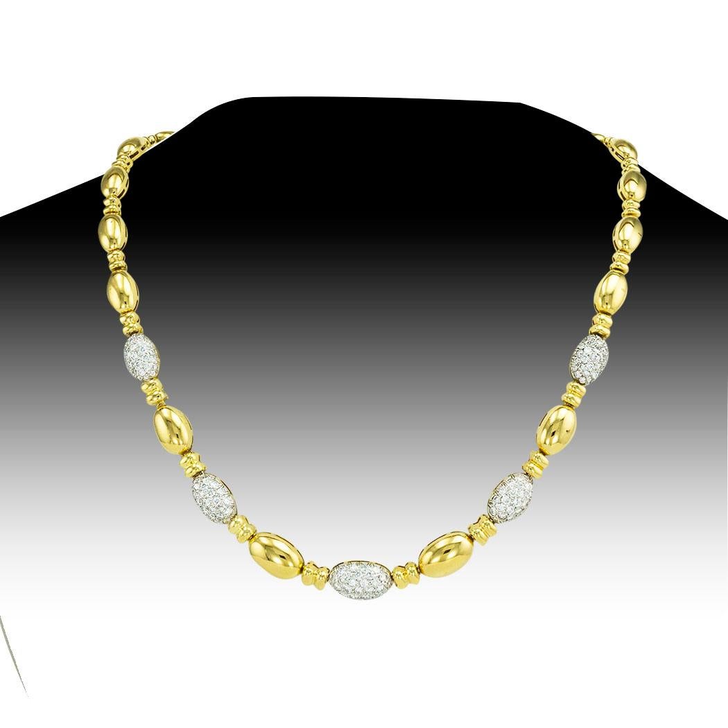 Diamond and yellow gold necklace circa 1990.  

ABOUT THIS ITEM:  #N1441. Scroll down for specifications.  Fine quality diamond pavé accents lend this Italian necklace a perfect balance between elegance, simplicity, and sophistication.  Clearly, it