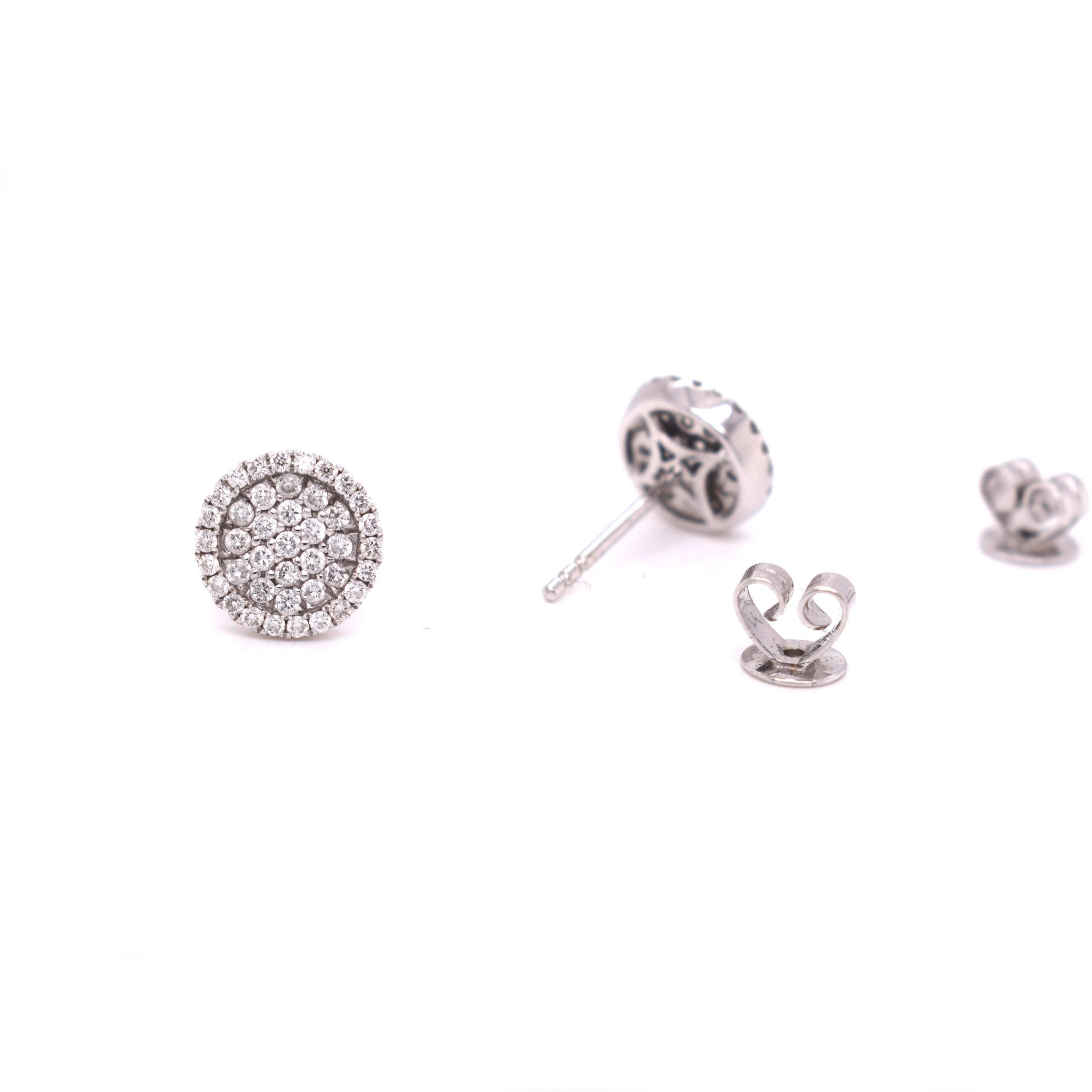 Diamond-Paved in White Gold Optical Illusion Diamond Halo Stud Earrings In Good Condition For Sale In Miami, FL