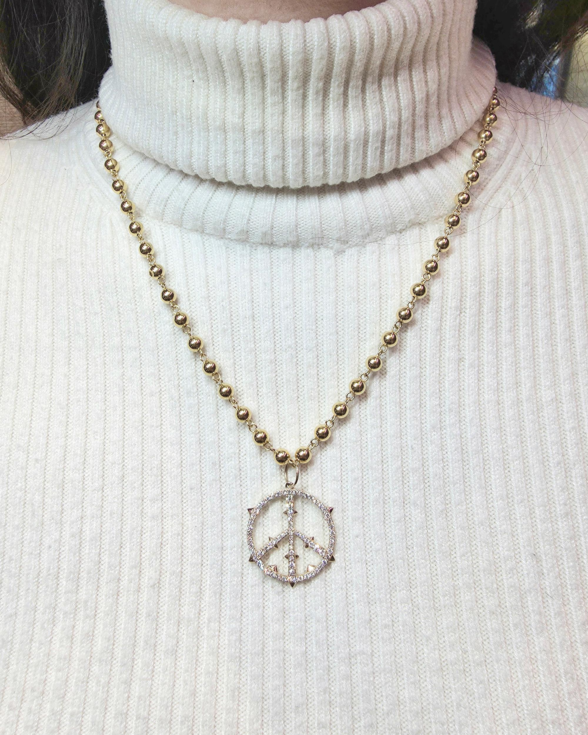 Contemporain Collier à pendentif de paix en or jaune 14 ct. en vente