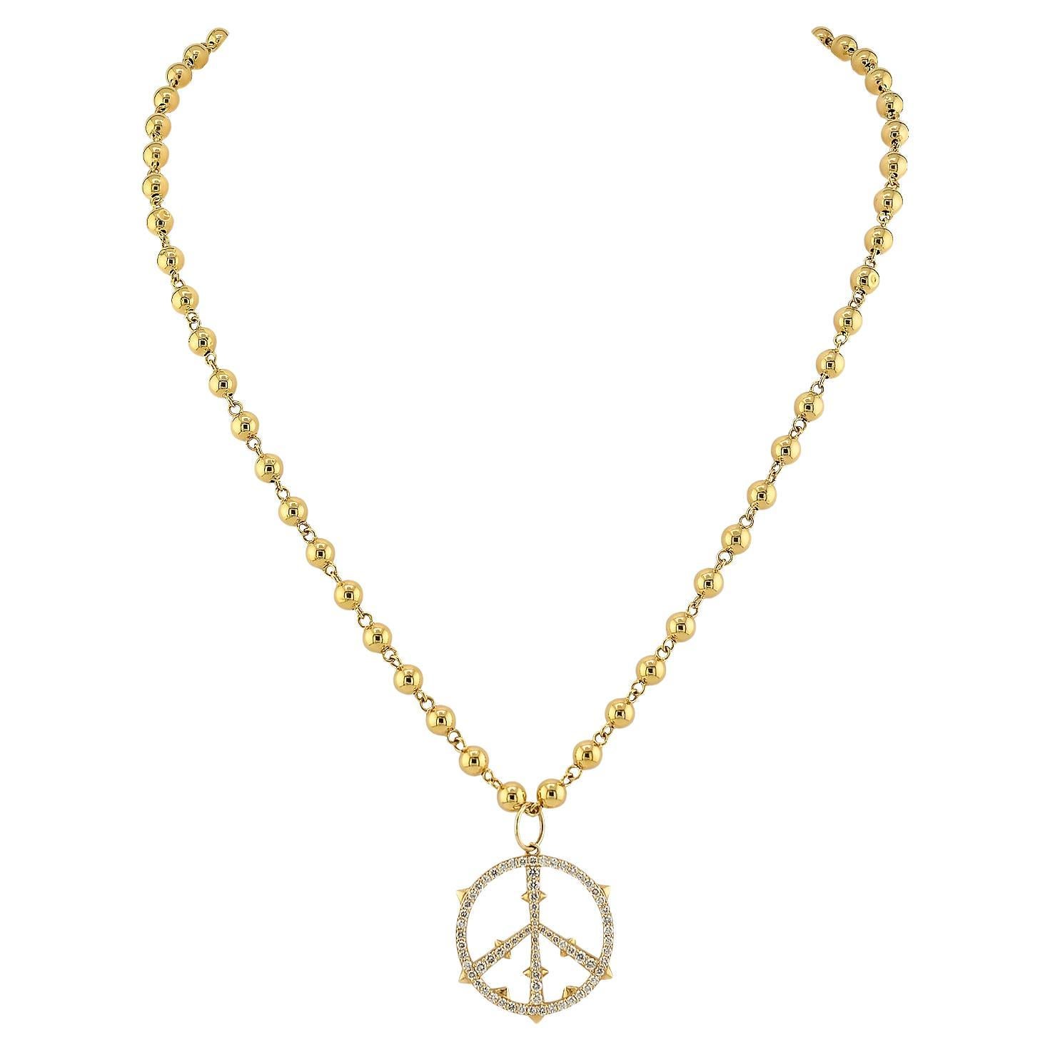 Collier à pendentif de paix en or jaune 14 ct. en vente