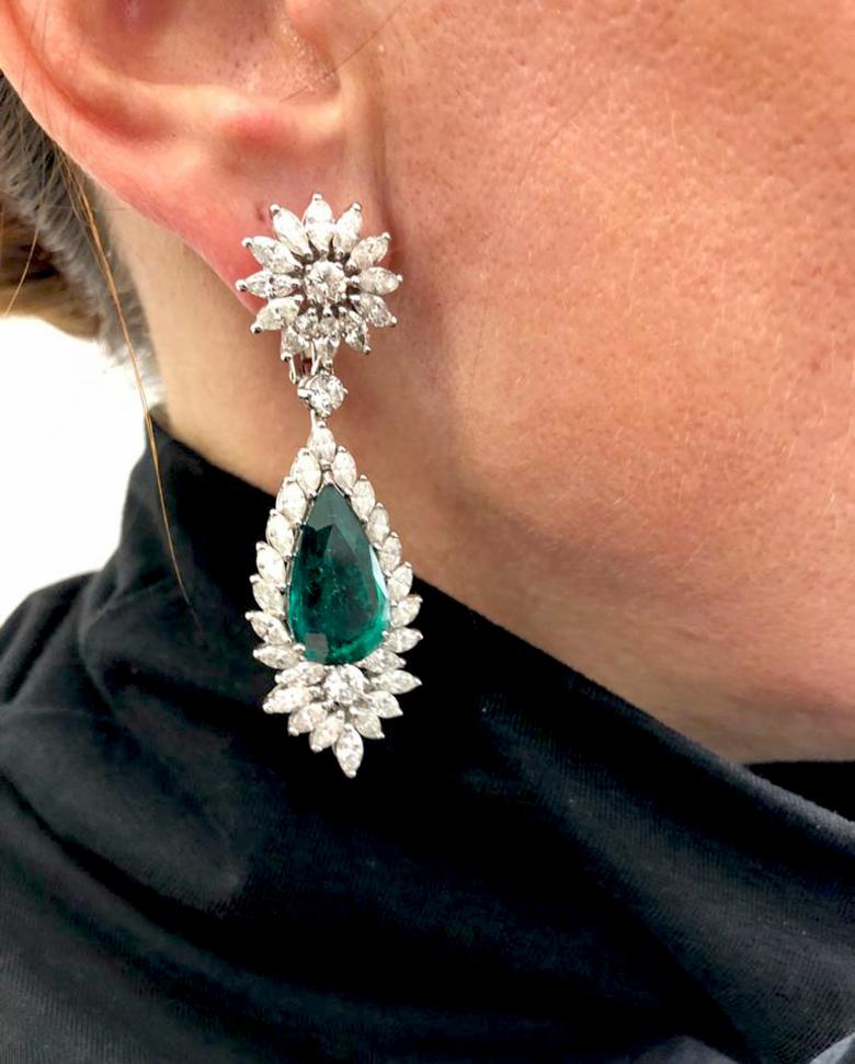 Diamond Pear Emerald Drop Earrings in 18k White Gold.
Emerald weight approx. 14.00 carats total. Diamond weight approx. 6.00 carats total. Emeralds measure approx. 10 x 19mm. Earrings measure approx. 2.25″ in length, 0.75″ in width, 0.25″ in height