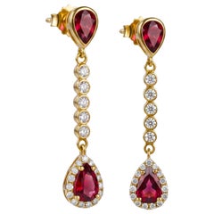 Orecchini pendenti a lariat con diamanti, rubino a forma di pera da 3,40 ct e montatura halo, in oro giallo 14k