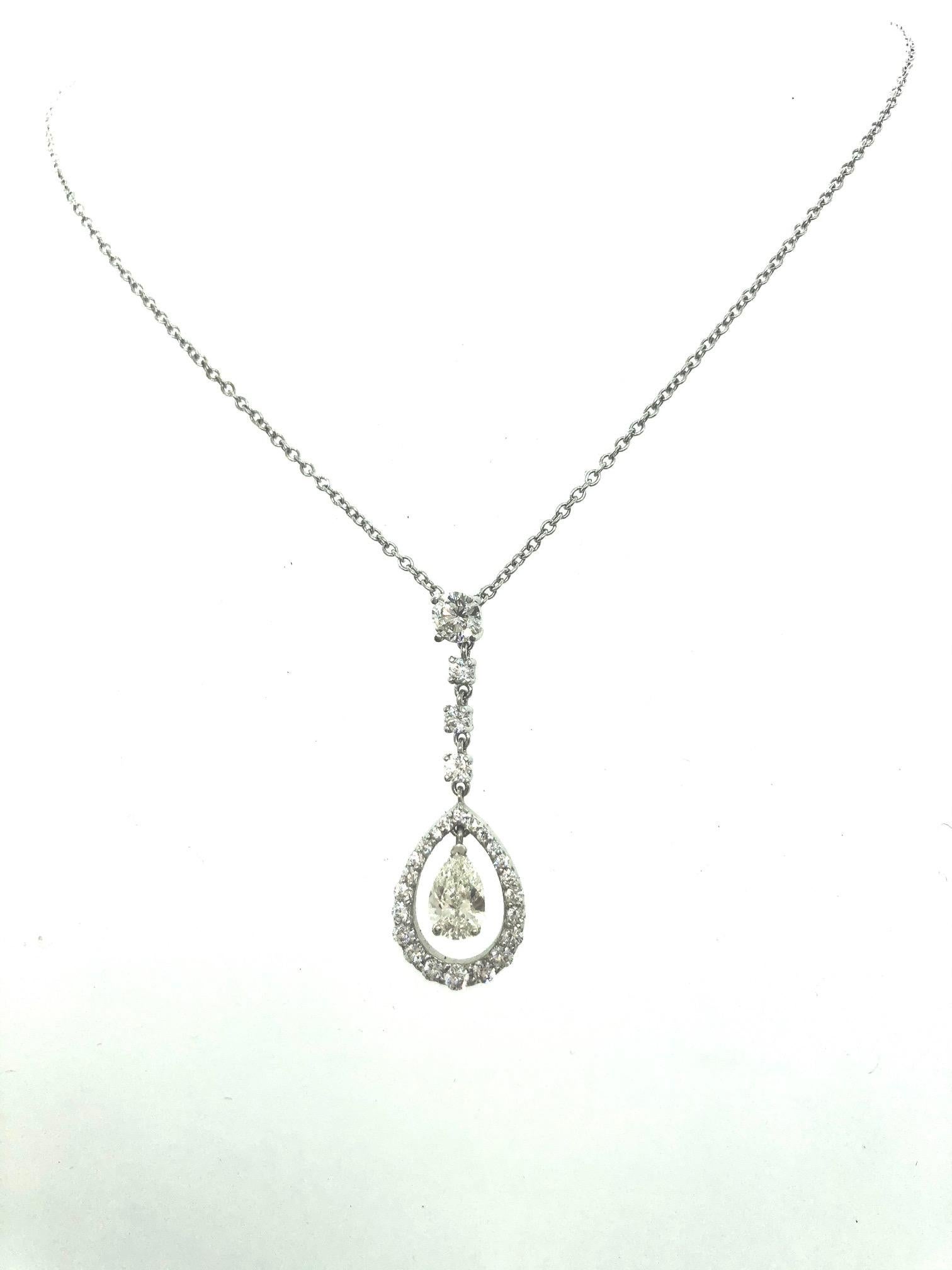 Diamond  Pear Shape and Round Necklace

Pear Shape weighs 0.38 carat J Color VS1 Clarity

with 0.55 carat Total Weight of Round Diamonds G/H Color SI Clarity

Set in 18Karat White Gold

ITEM DETAILS

    Item Number: J2917

Setting Information

   