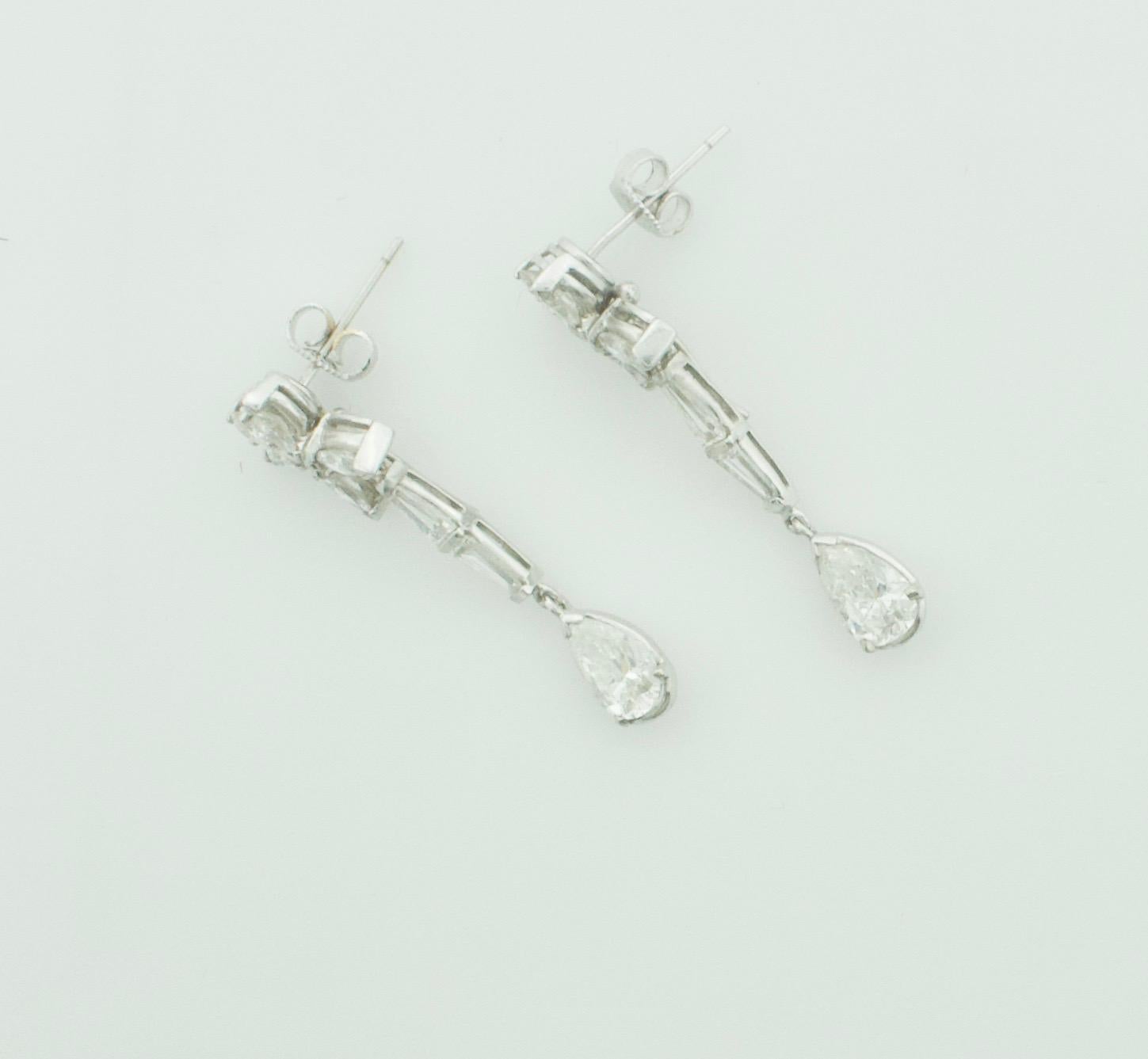 diamond shaped earrings hanging