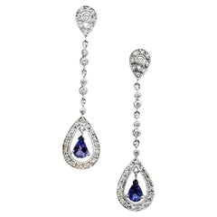 Orecchini a goccia con diamante a forma di pera e tanzanite in oro bianco 14 carati