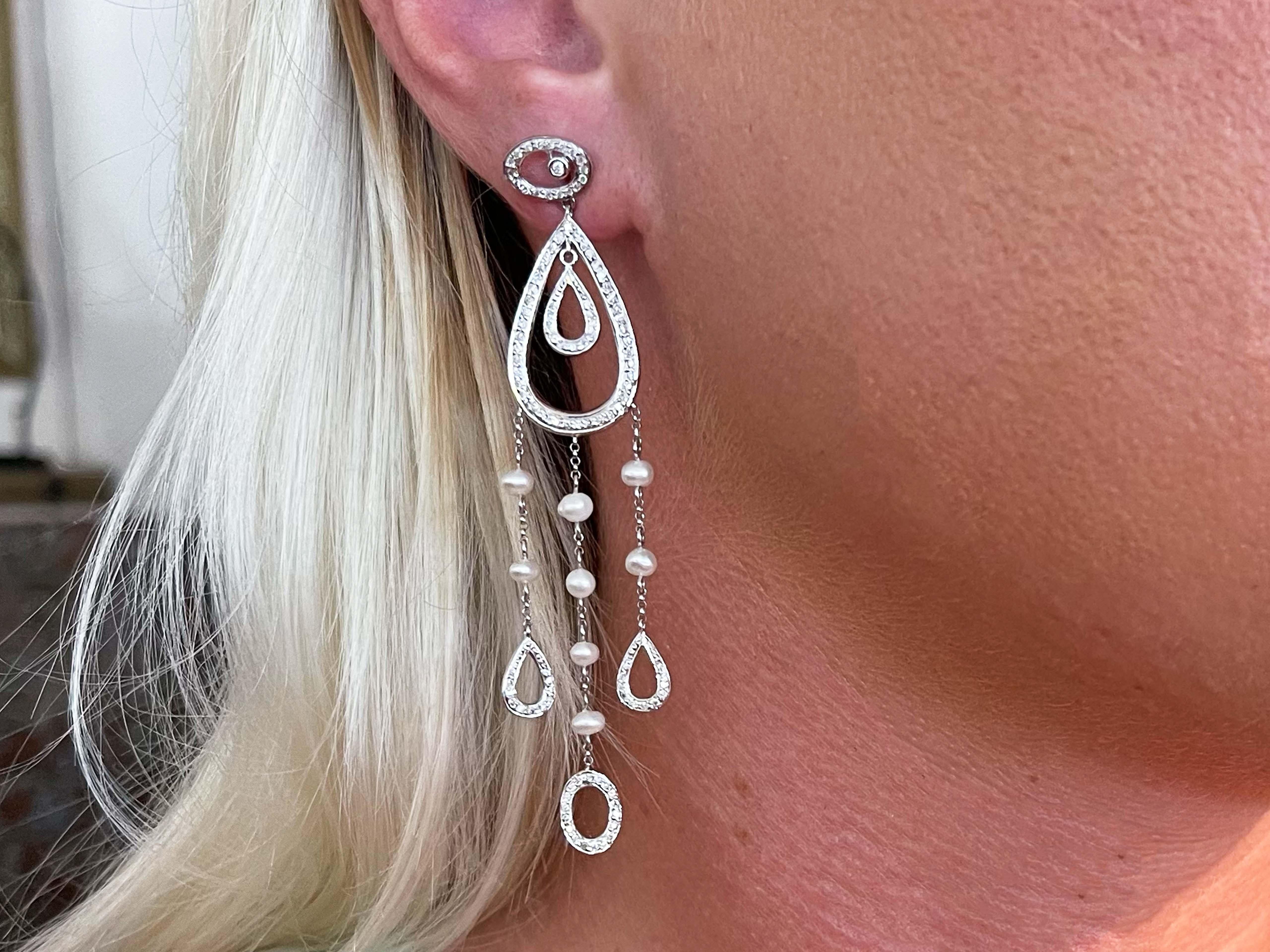Item Specifications:

Metal: 14k White Gold

Total Weight: 10.3 Grams

Earring Diameter: 3.3
