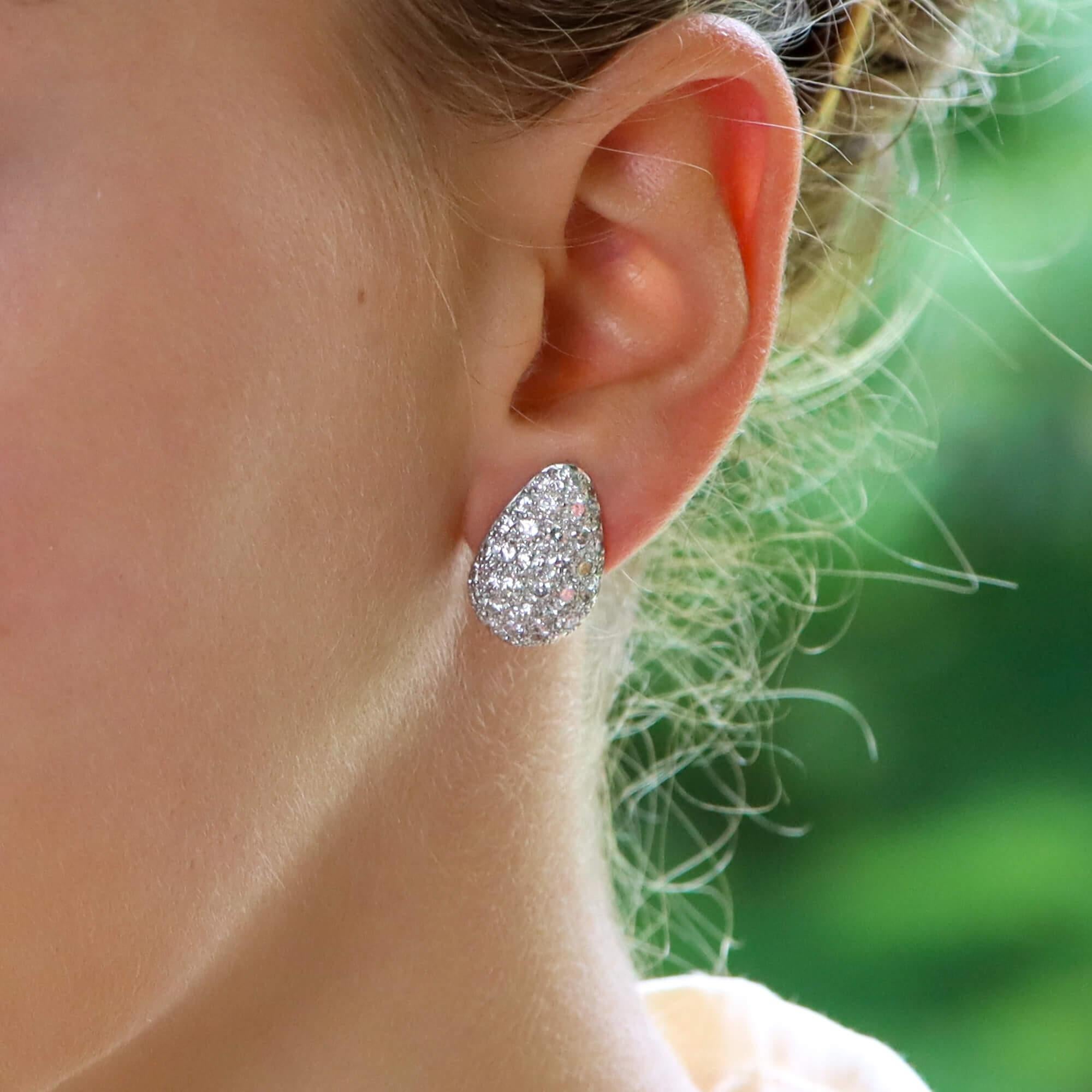 Modern Diamond Pear Shaped Earrings Set in Platinum For Sale