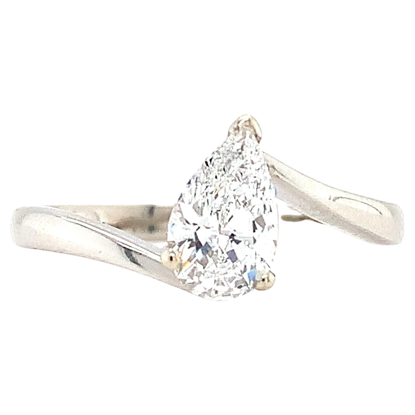 Diamond pear shaped solitaire engagement ring 18k white gold
