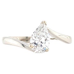 Diamond pear shaped solitaire engagement ring 18k white gold