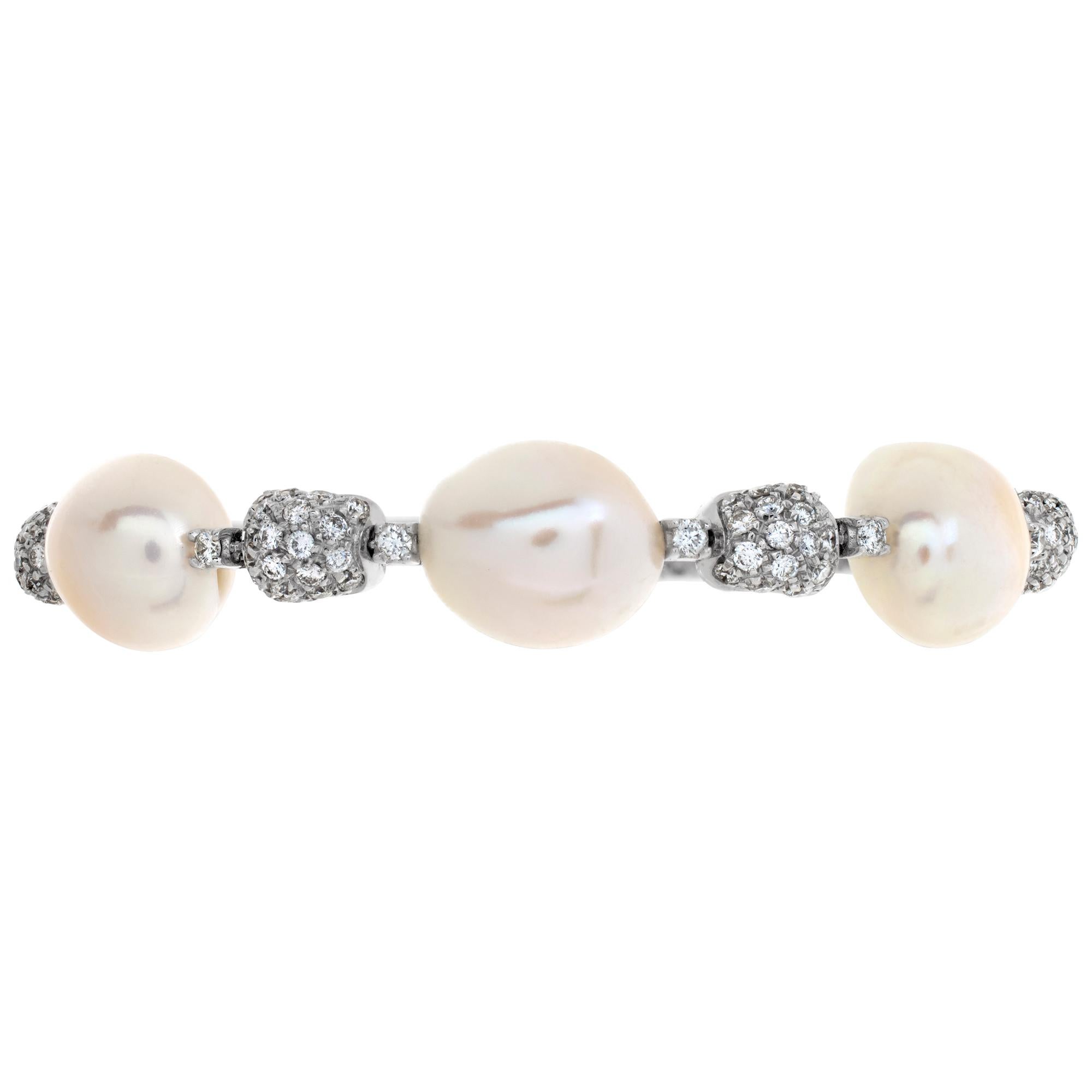 Bracciale con perle di diamante in oro bianco 18 carati con sfumature argento e rosa e circa 1,5 carati di colore G-H e purezza VS. Si adatta a polsi da 6