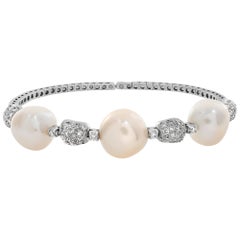 Diamond pearl 18k white gold bangle with silver and pink overtones