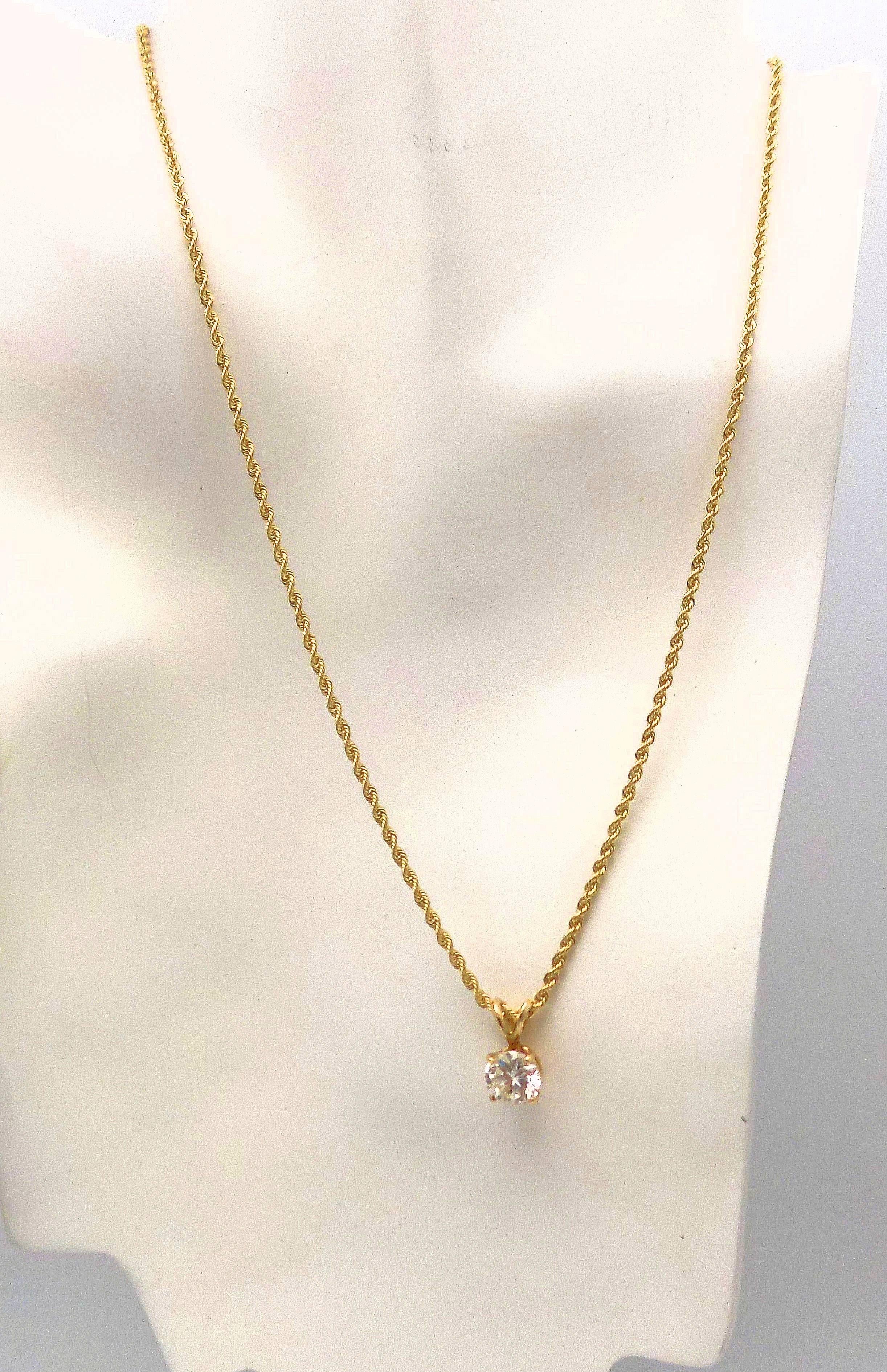 Classic design that never goes out of style. 14 Karat Yellow Gold Pendant Featuring 1 Round Brilliant Diamond 1.90 Carat SI-3, J-K; 18