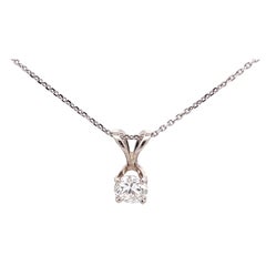 Colgante y cadena de diamantes en oro blanco de 14k