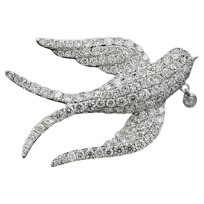 ChatGPT:
Experience elegance and symbolism with this exquisite diamond bird pendant and brooch, a sophisticated jewelry piece with deep meaning. Designed in the graceful form of a soaring swallow, it is adorned with 131 natural brilliant-cut