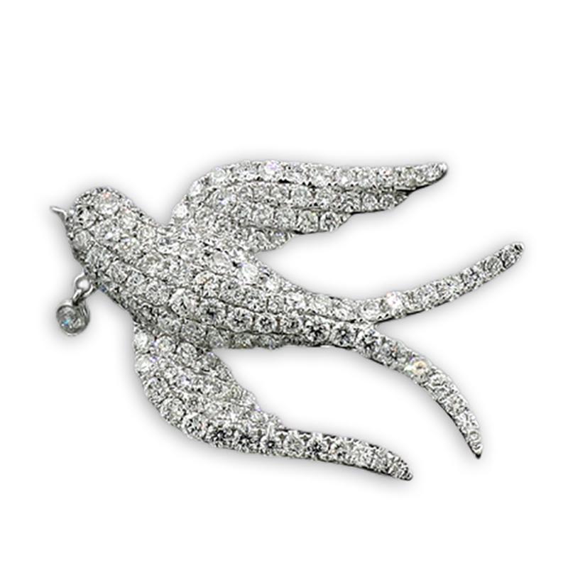 Contemporary Diamond Pendant / Brooch Swallow with miniature pendant 18 Karat White Gold For Sale