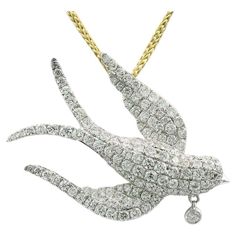 Diamond Pendant / Brooch Swallow with miniature pendant 18 Karat White Gold For Sale