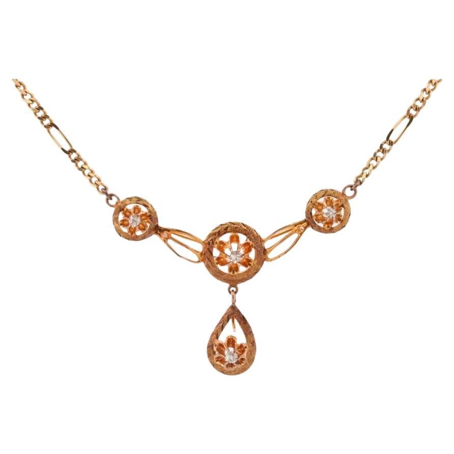 Diamond pendant lavaliere. 14k Gold with a diamond set buttercup necklace.