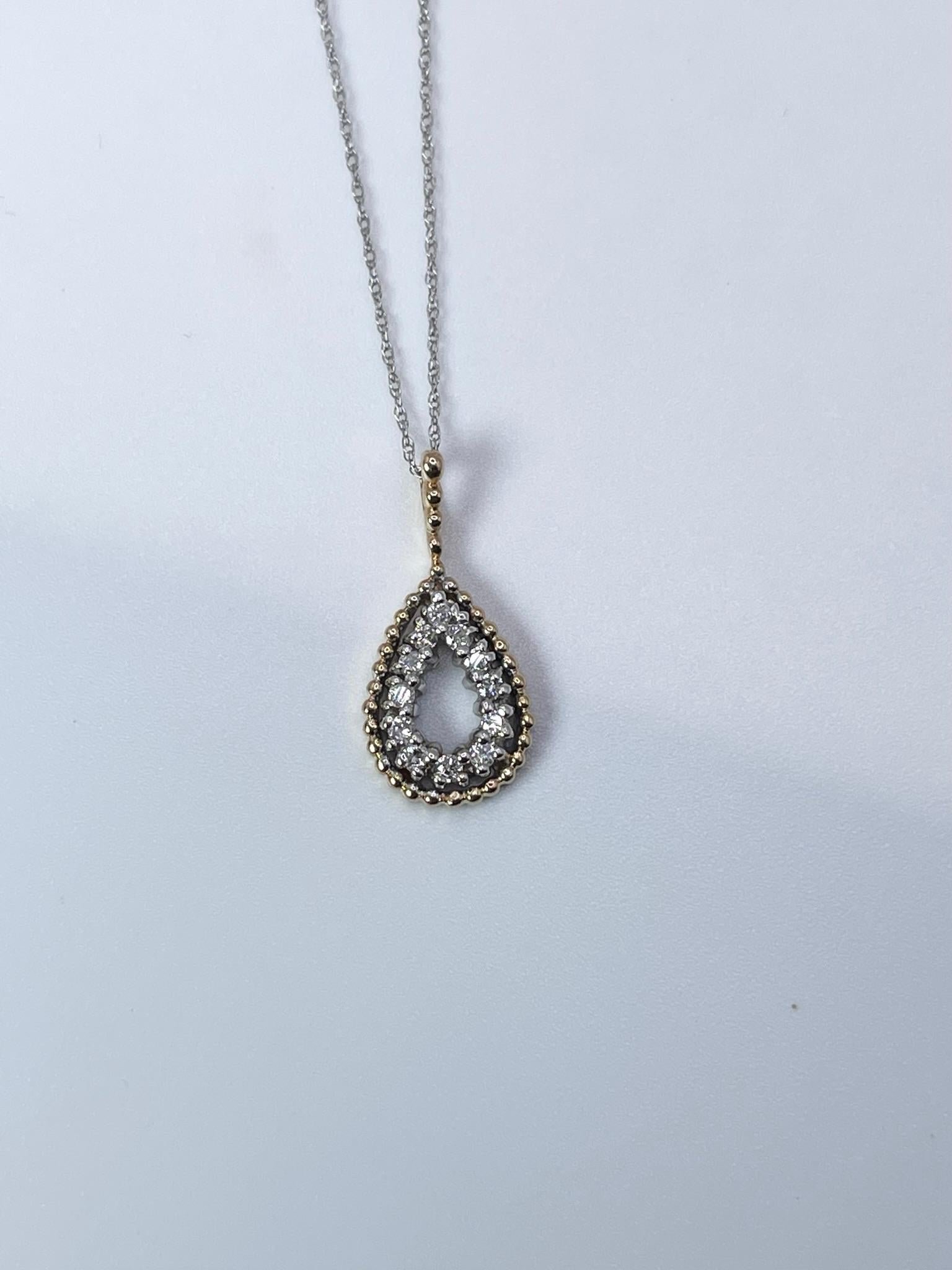 Elegant diamond pendant in pear shape with natural diamonds in two tone gold 14KT marked.

GRAM WEIGHT: 1.62gr
GOLD: 14KT white/yellow gold
NECKLACE chain-18