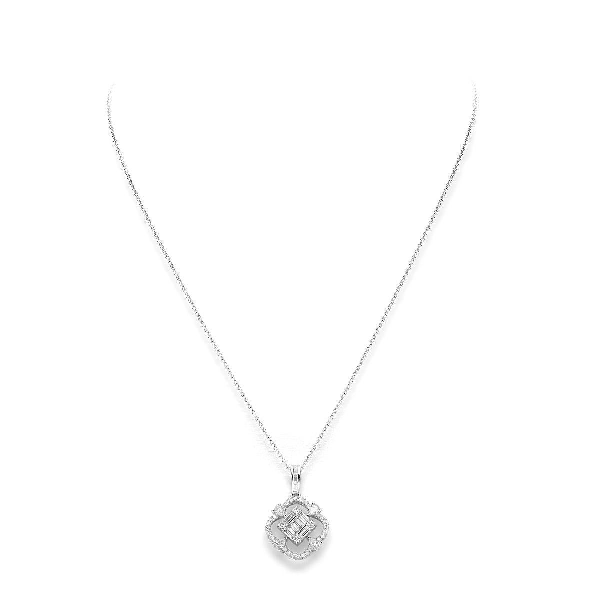Pendant in 18kt white gold set with 32 diamonds 0.28 cts and 11 baguette cut diamonds 0.42 cts and 4 pear.shaped cut diamonds 0.29 cts