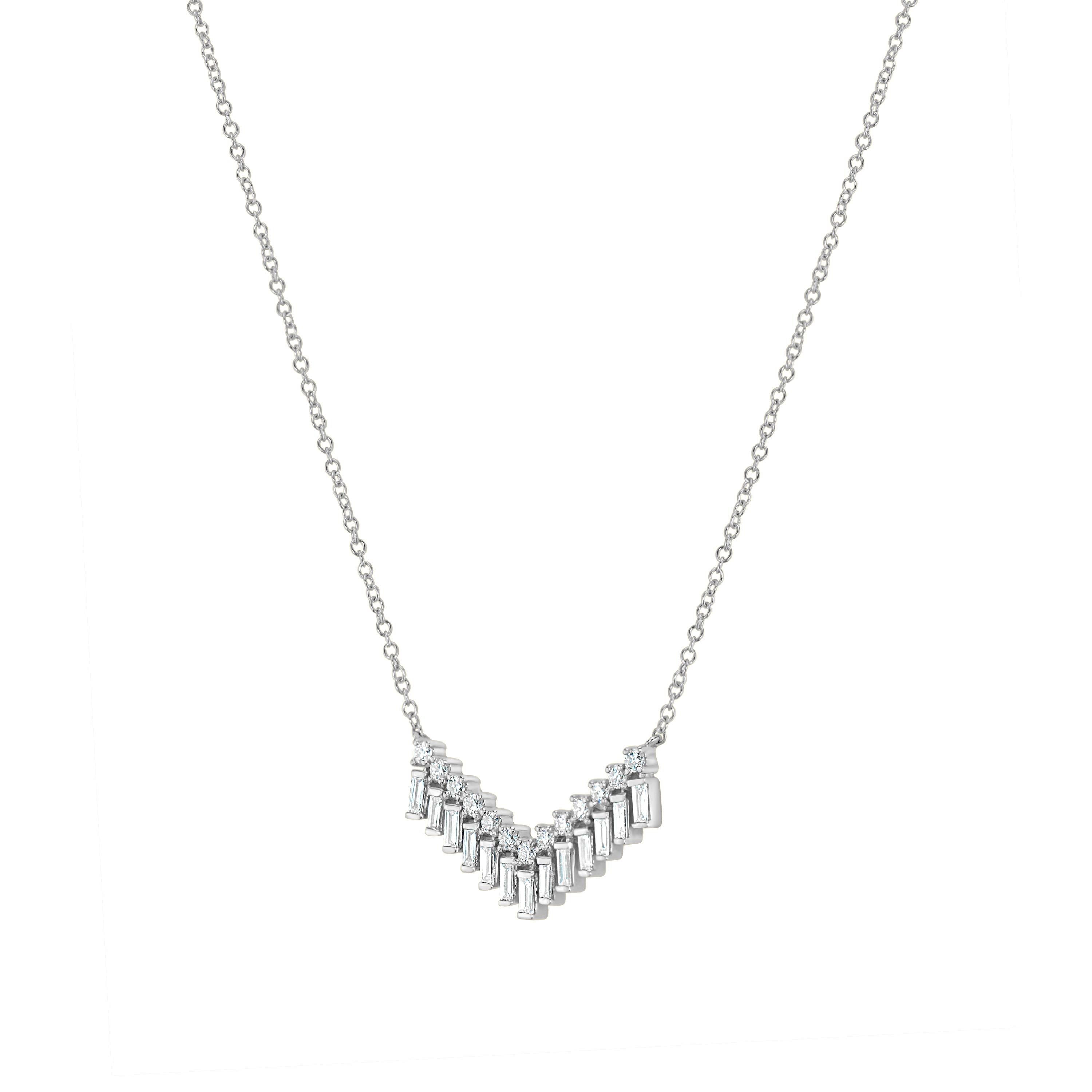 Experience the epitome of luxury with the Cascade Diamond Necklace. This masterpiece features a cable chain adorned with meticulously set diamonds, each one radiating brilliance and elegance. The necklace's unique design, with its cascading diamond