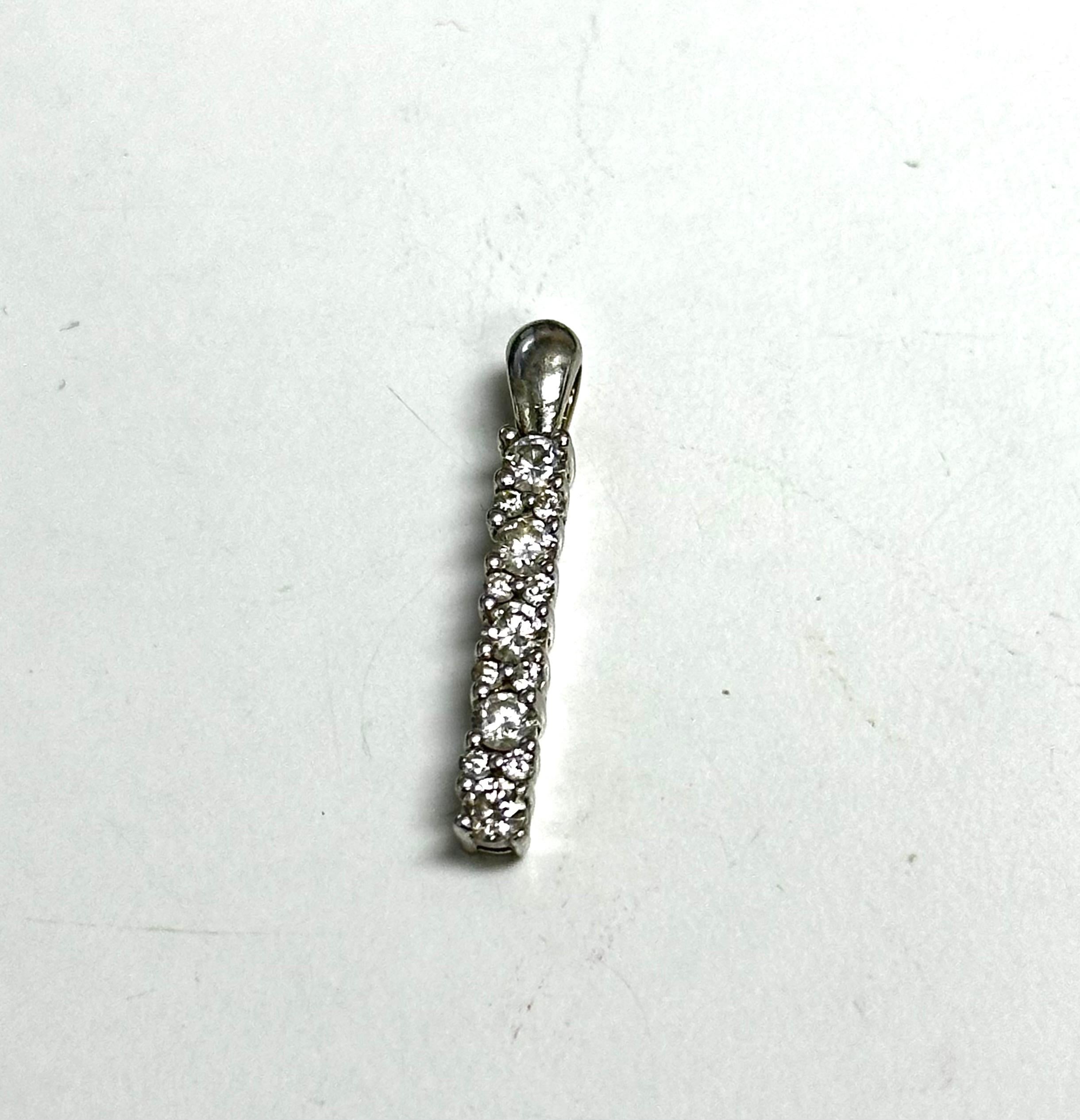 Stock# P7598

Diamonds Shape: Round
Diamonds Weight: 0.25 ct
Number of Diamonds : 13 Pcs
Diamond Color: G-H
Diamond Clarity: VSSI

Setting Metal: 14K White Gold
Setting Metal Weight: 2.00 gm 