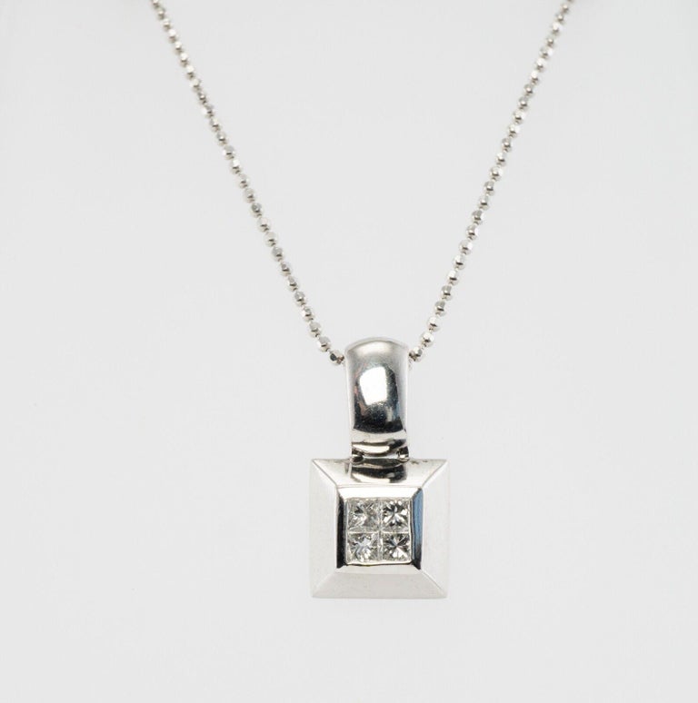 Diamond Pendant Necklace Platinum 14K Gold Chain SPARK

This beautiful pendant is finely crafted in Platinum and set with four princess cut diamonds. The diamonds are estimated to be VVS2 clarity and G color for the total .20 carat. The pendant is